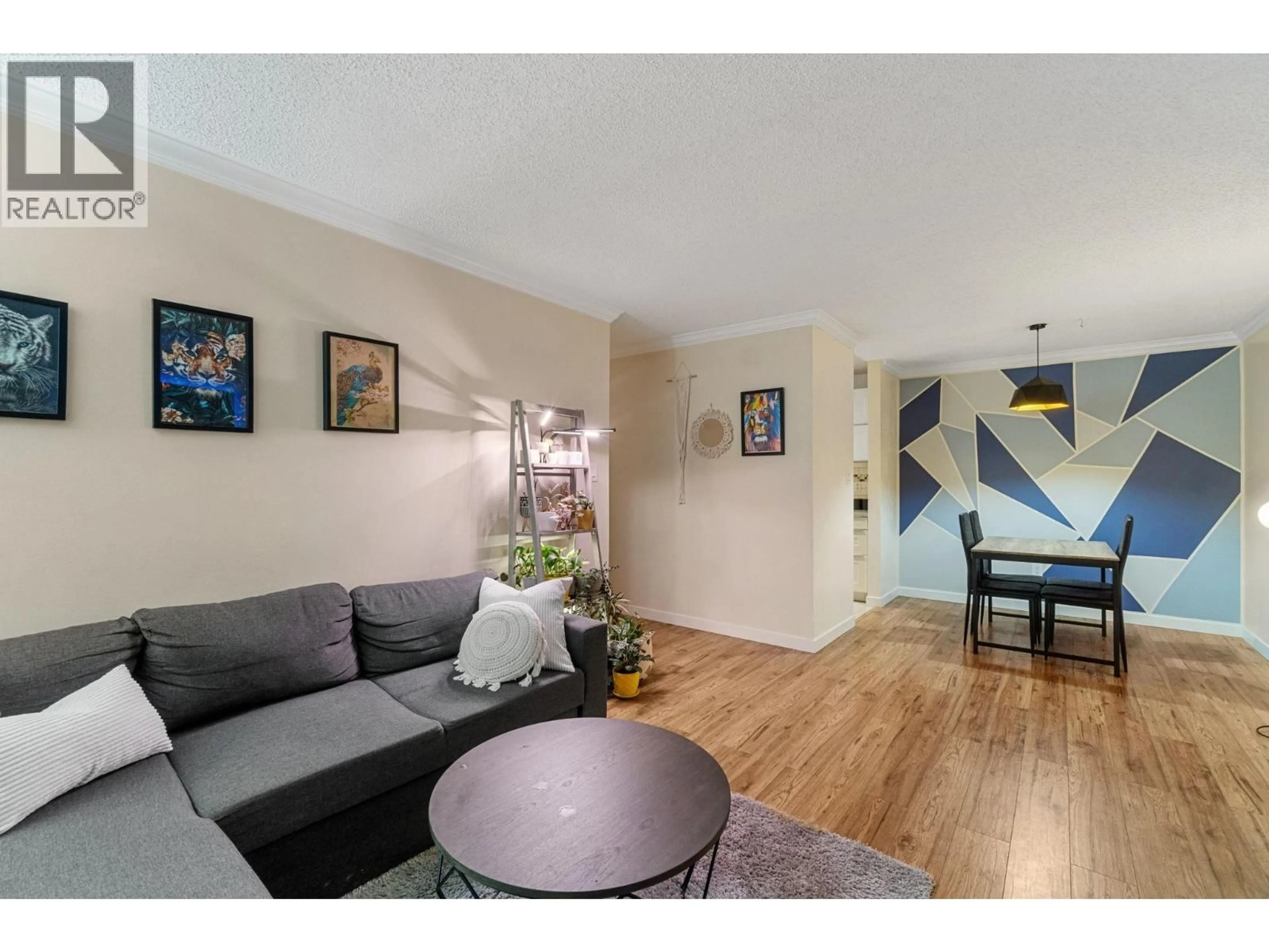 Living room with furniture, wood/laminate floor for 118 - 7431 MINORU BOULEVARD, Richmond British Columbia V6Y1Z3