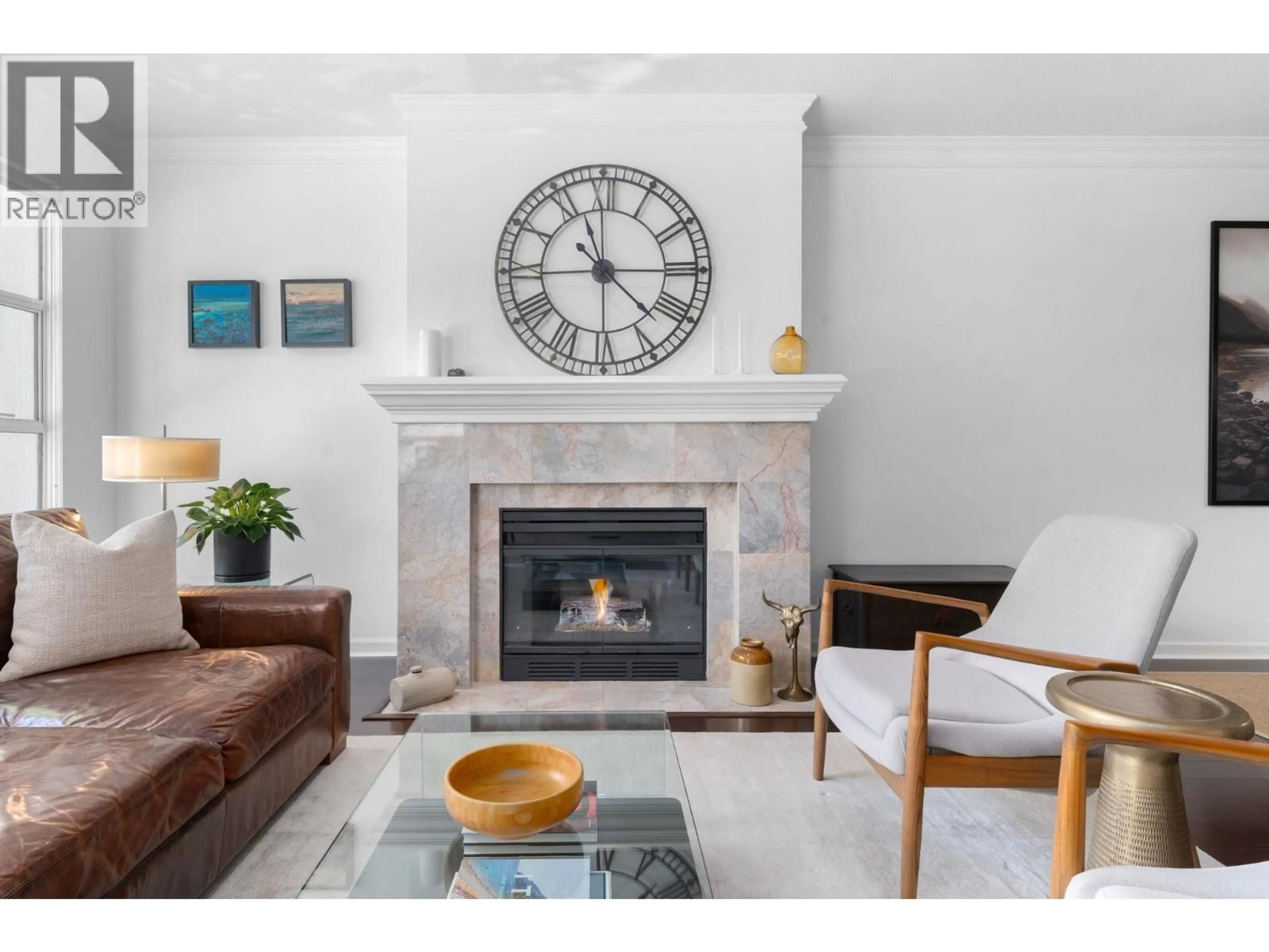 Living room with furniture, ceramic/tile floor for 204 - 3151 WOODBINE DRIVE, North Vancouver British Columbia V7R2S4