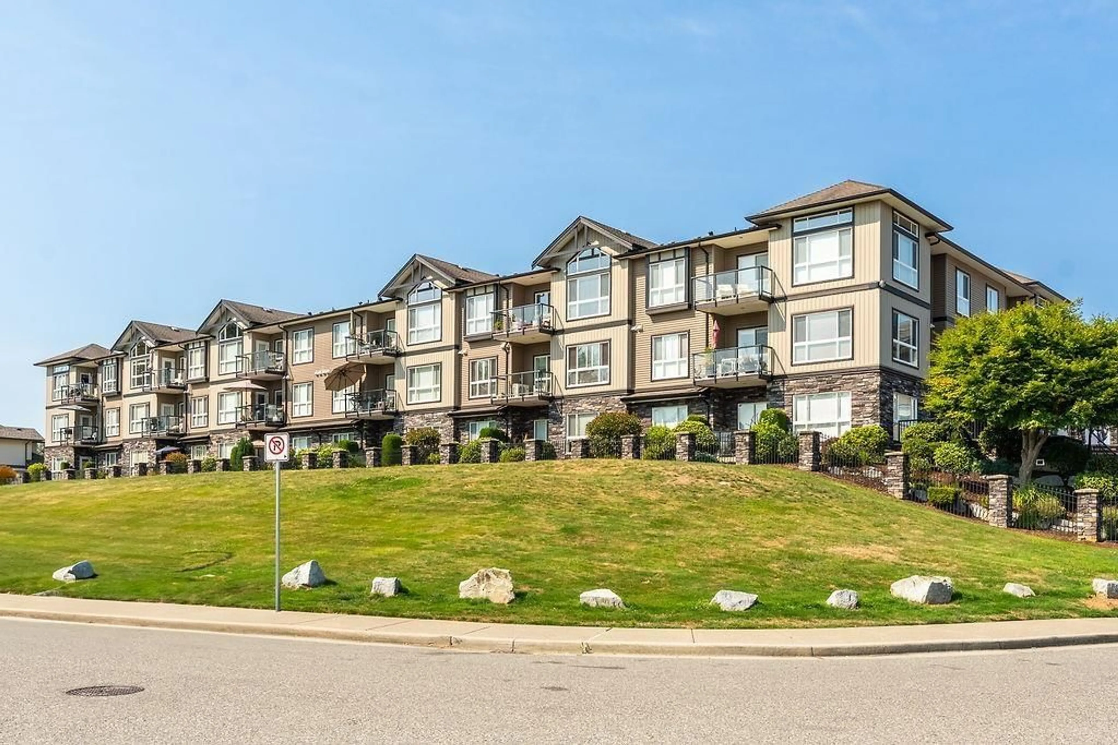 A pic from outside/outdoor area/front of a property/back of a property/a pic from drone, mountain view for A116 - 33755 7TH AVENUE, Mission British Columbia V2V0A4