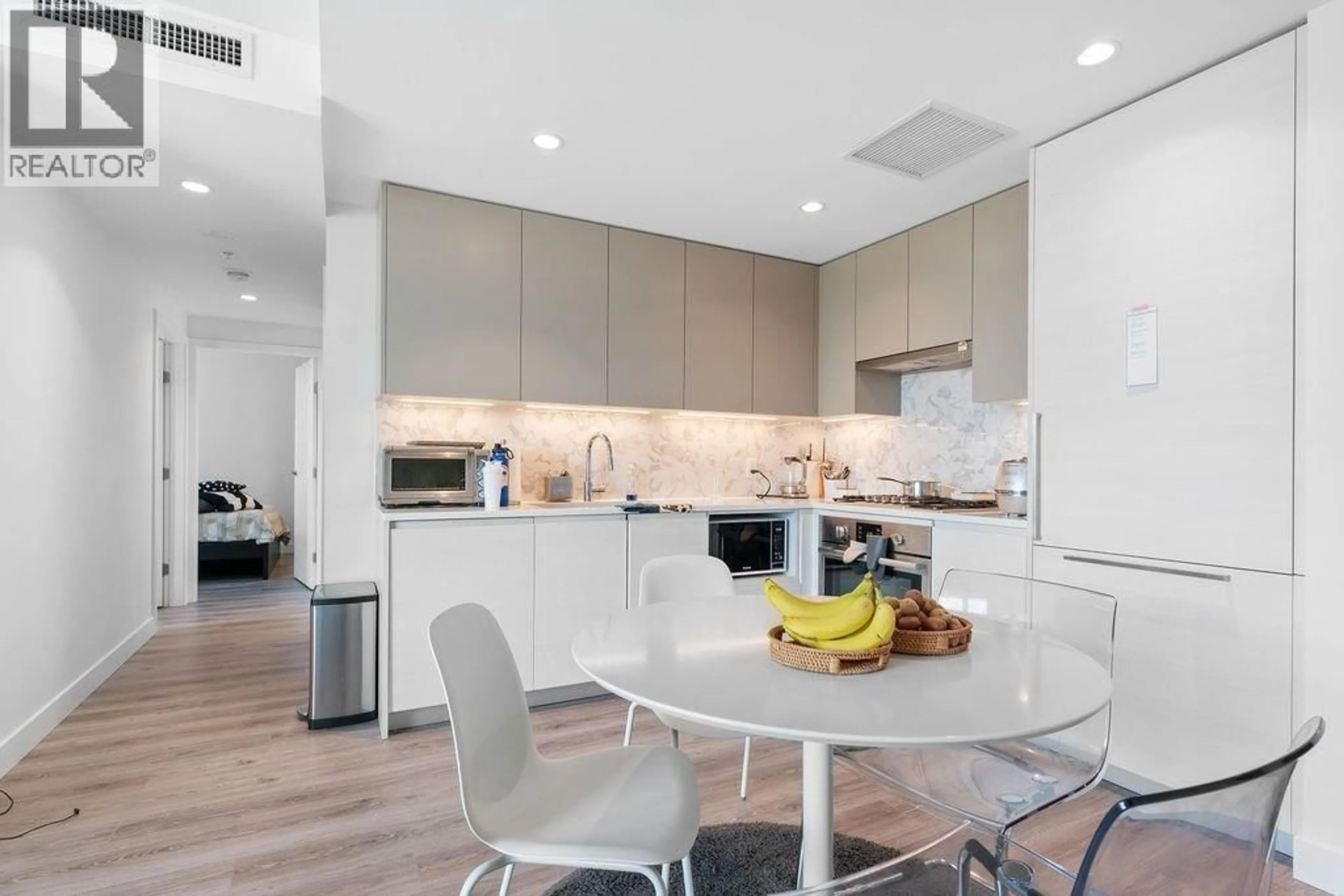 Open concept kitchen, unknown for 205 - 8188 FRASER STREET, Vancouver British Columbia V5X0J8