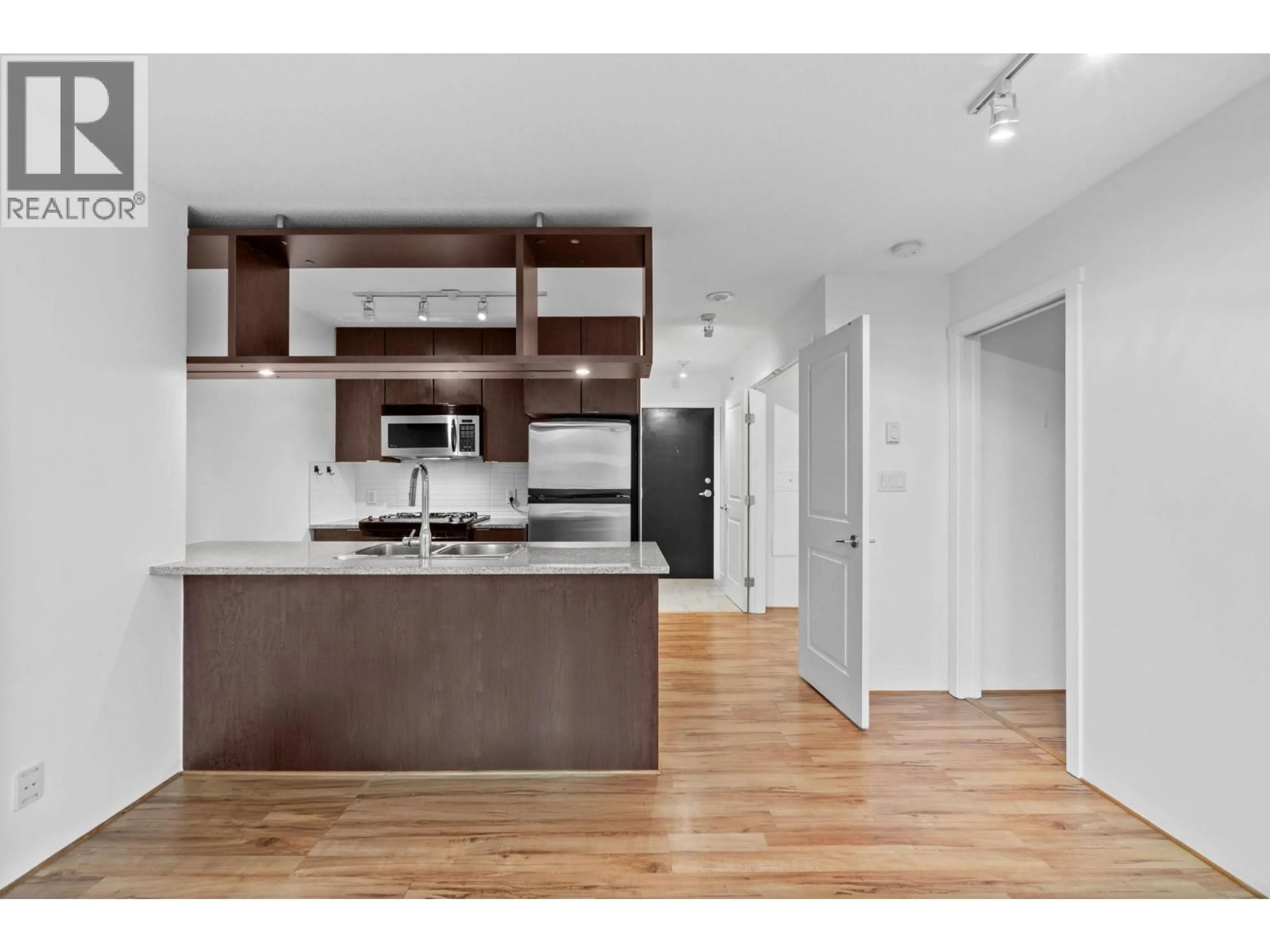 Open concept kitchen, wood/laminate floor for 505 - 1001 RICHARDS STREET, Vancouver British Columbia V6B1J6