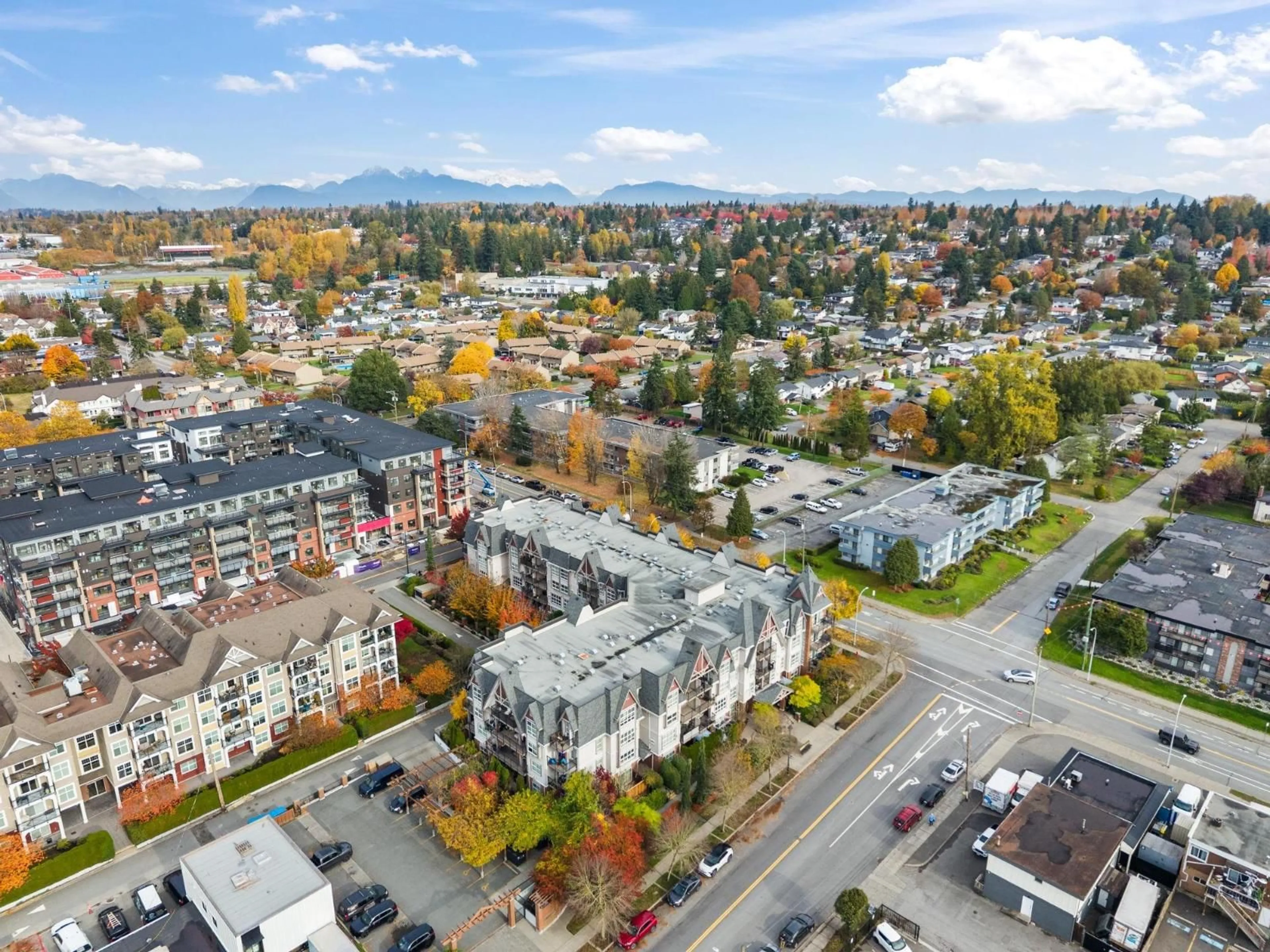 A pic from outside/outdoor area/front of a property/back of a property/a pic from drone, mountain view for 403 - 17769 57 AVENUE, Surrey British Columbia V3S1H1