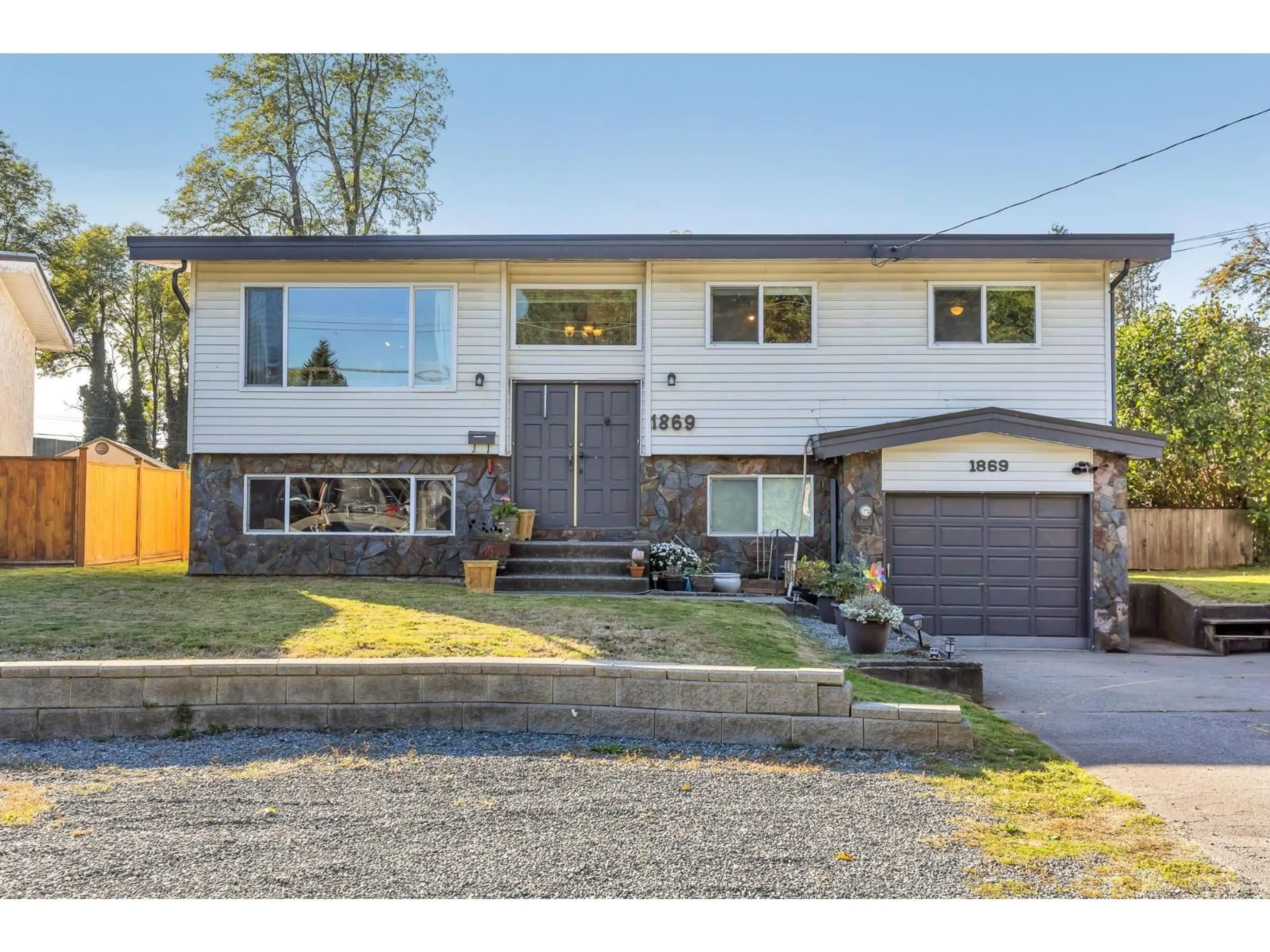 Home with brick exterior material, street for 1869 WESTBURY AVENUE, Abbotsford British Columbia V2S1B9