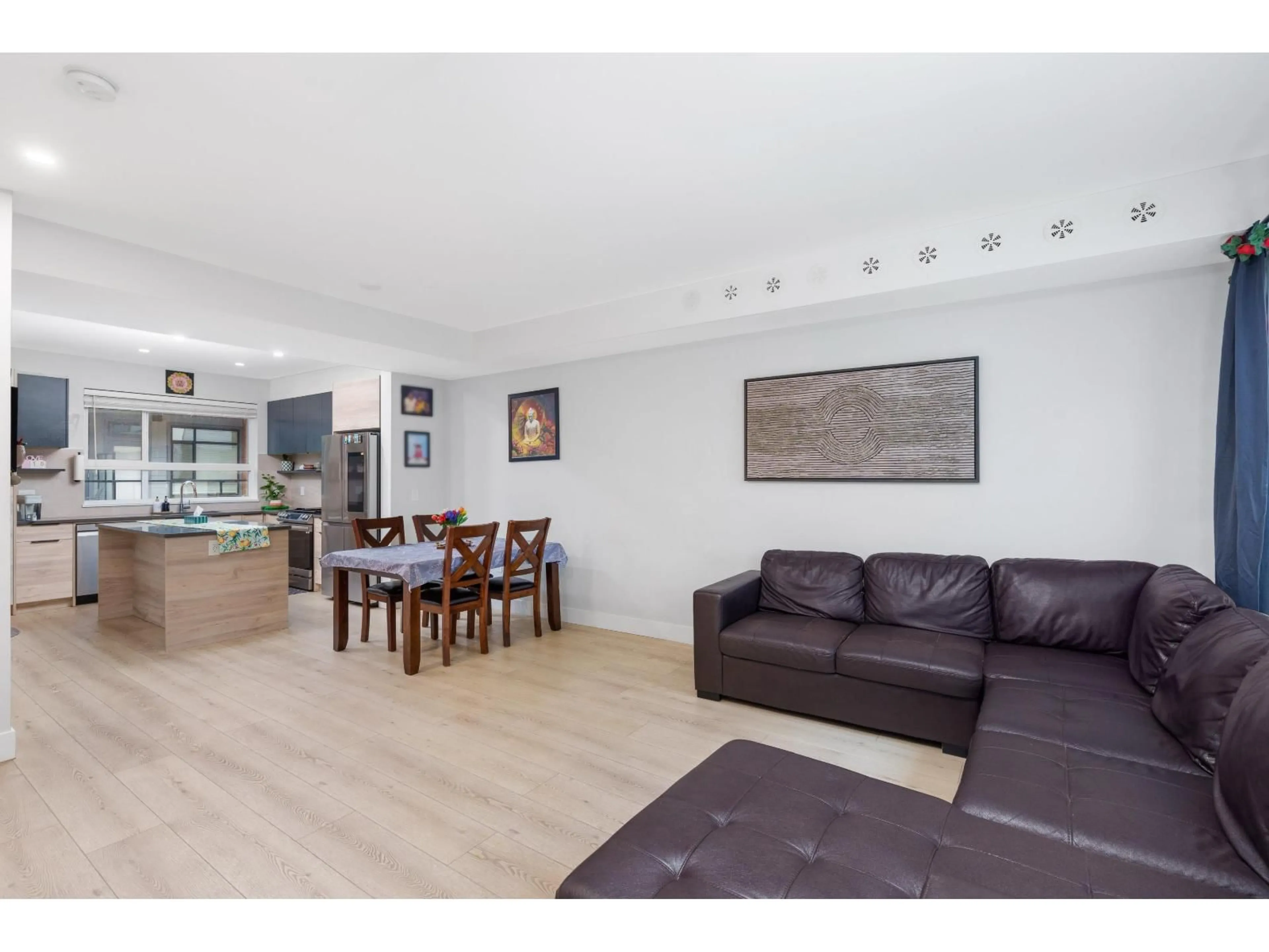 Living room with furniture, wood/laminate floor for 128 - 30530 CARDINAL AVENUE, Abbotsford British Columbia V2T0L5