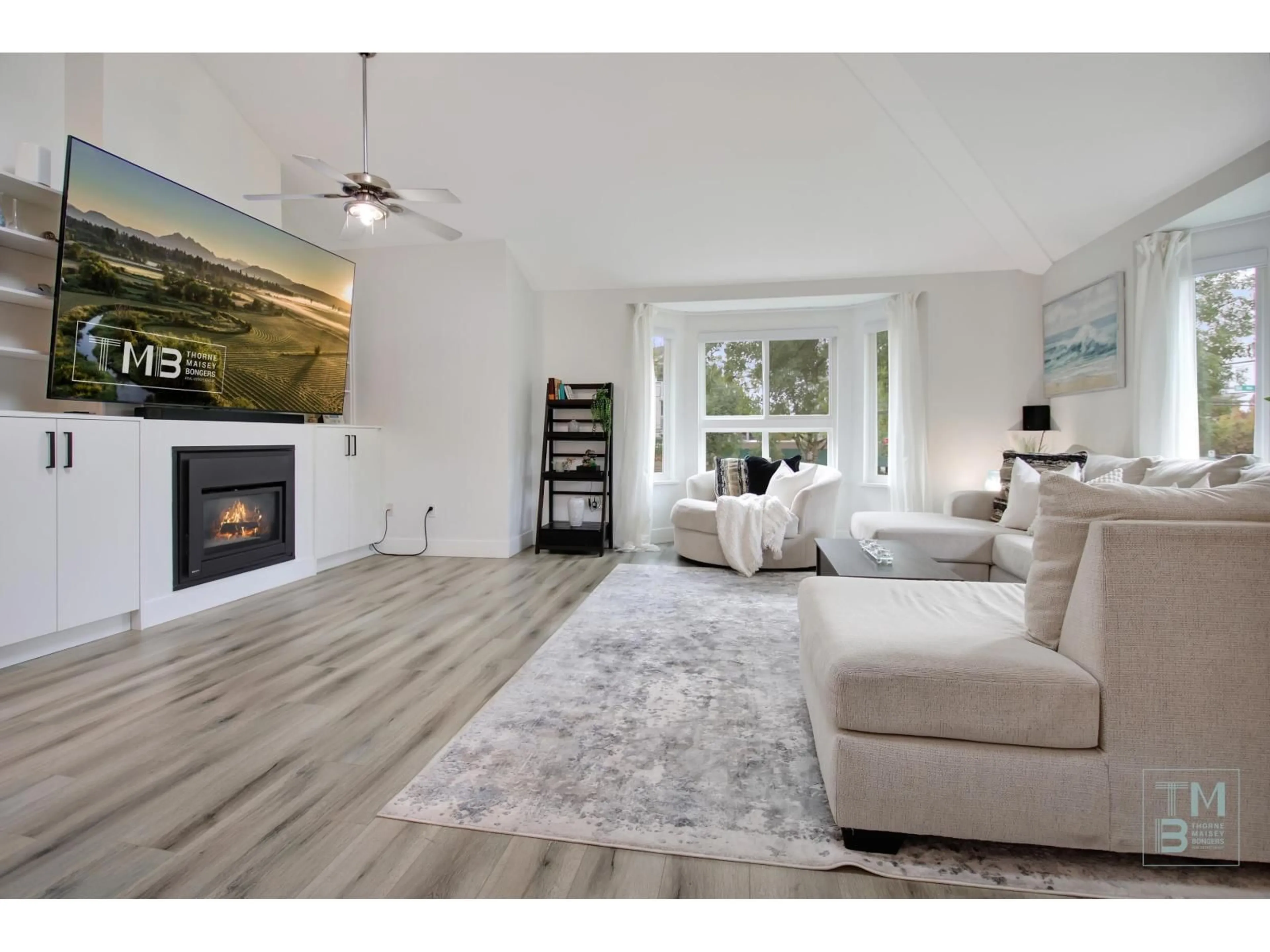 Living room with furniture, wood/laminate floor for 213 - 19721 64 AVENUE, Langley British Columbia V2Y1L1