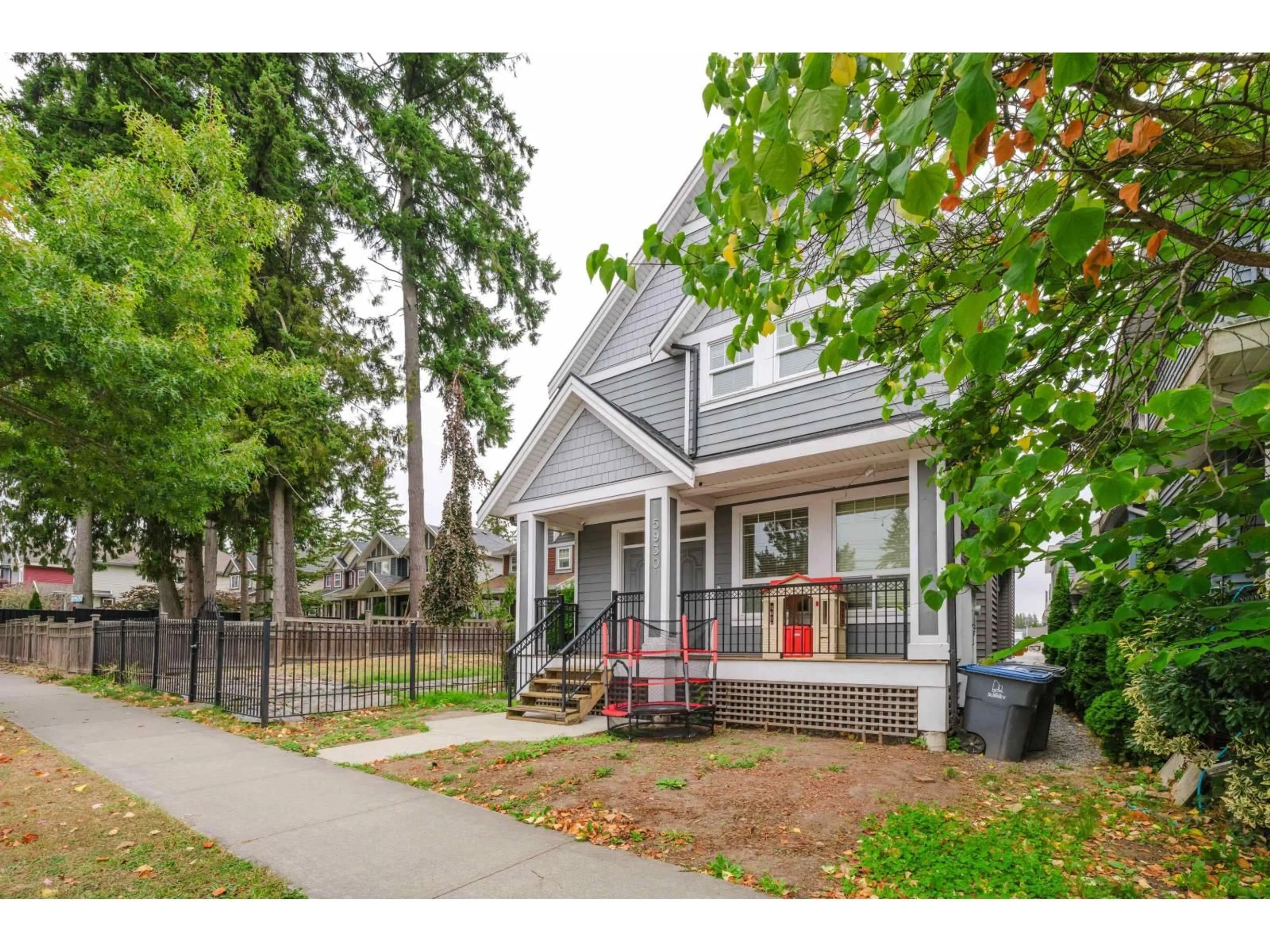 Home with vinyl exterior material, street for 5930 128 STREET, Surrey British Columbia V3X1T3