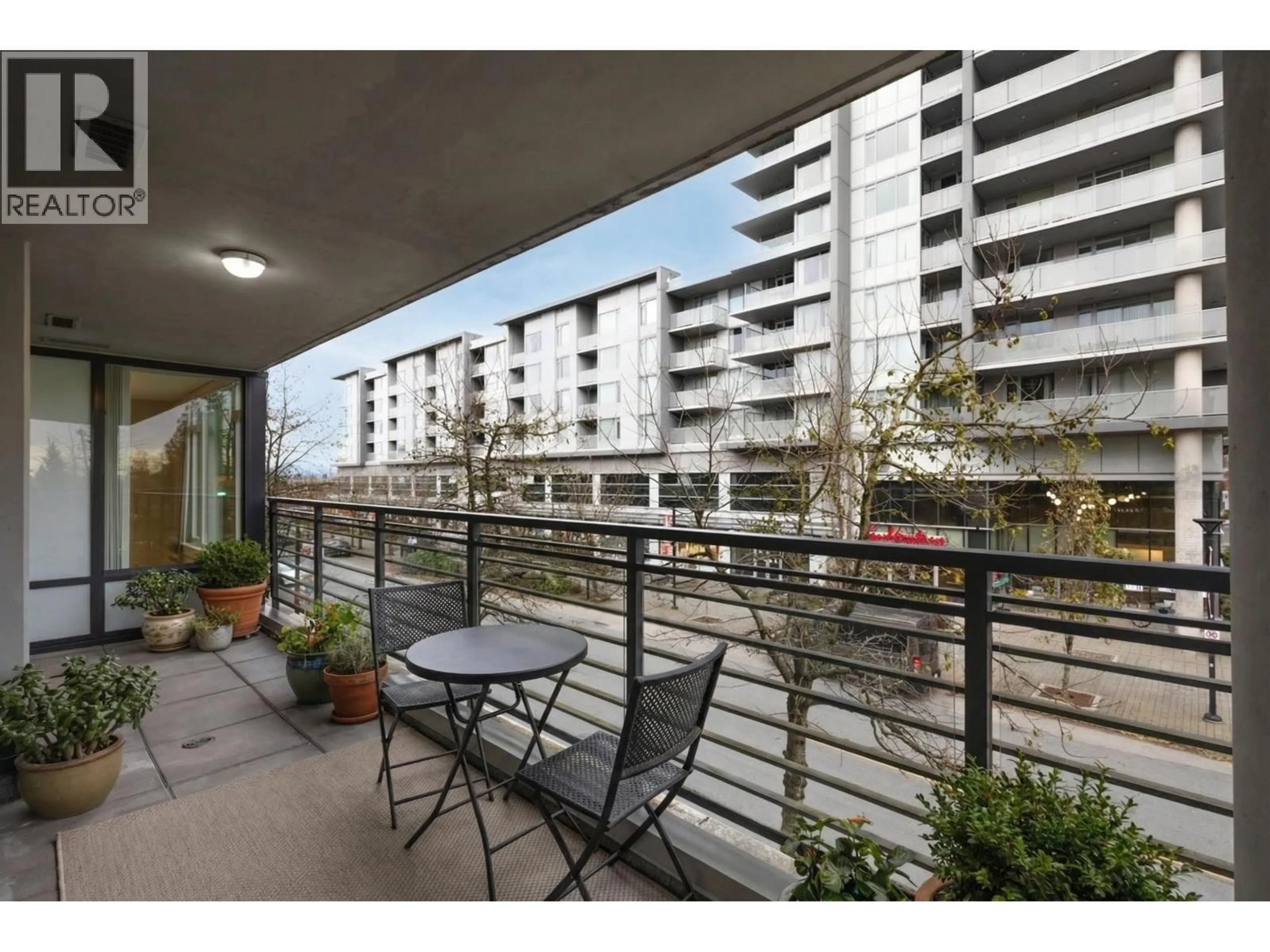 Balcony in the apartment, city buildings view from balcony for 425 - 9009 CORNERSTONE MEWS, Burnaby British Columbia V5A0B9