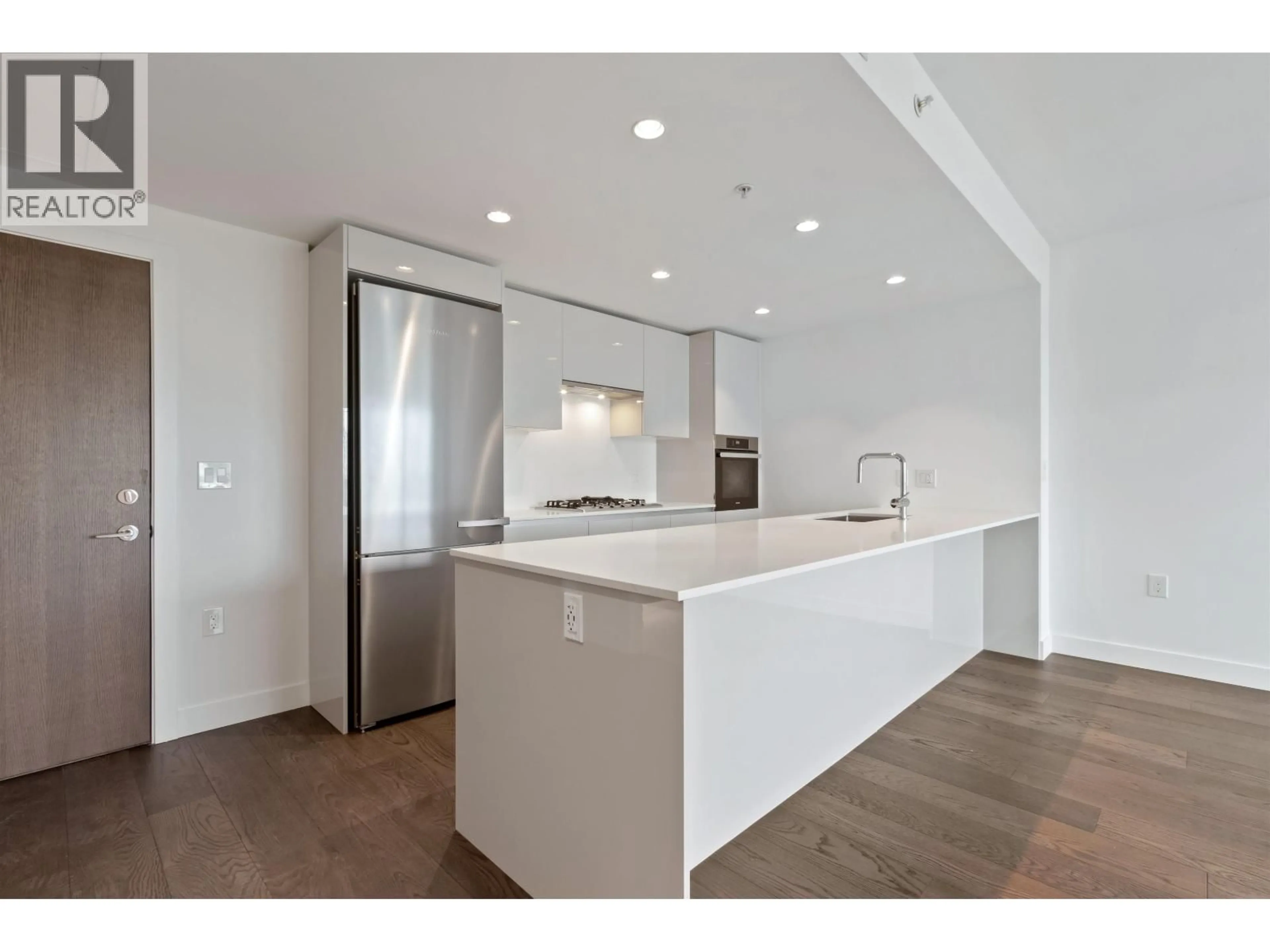 Open concept kitchen, unknown for 706 - 5788 GILBERT ROAD, Richmond British Columbia V6X1B7