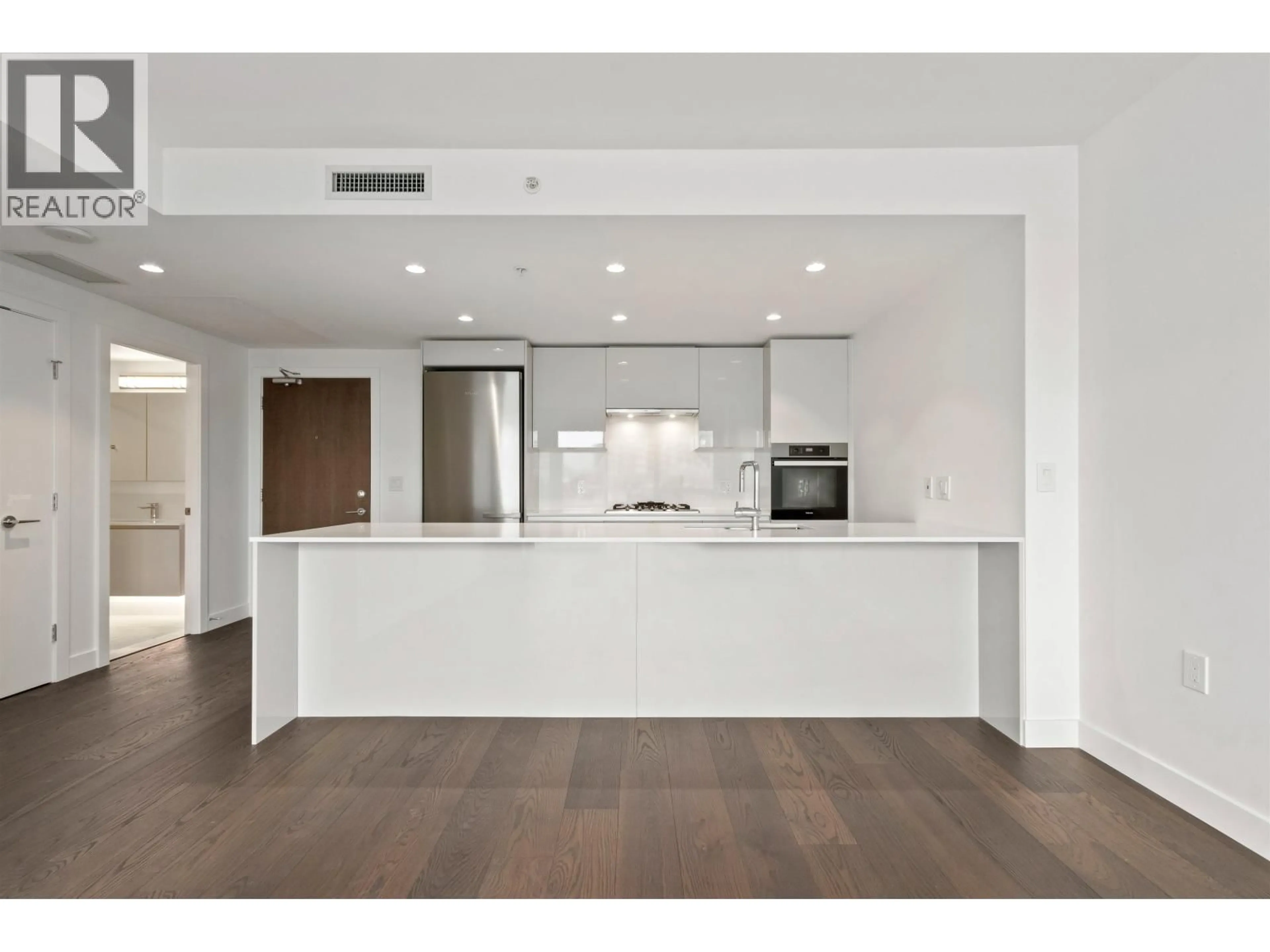 Open concept kitchen, unknown for 706 - 5788 GILBERT ROAD, Richmond British Columbia V6X1B7