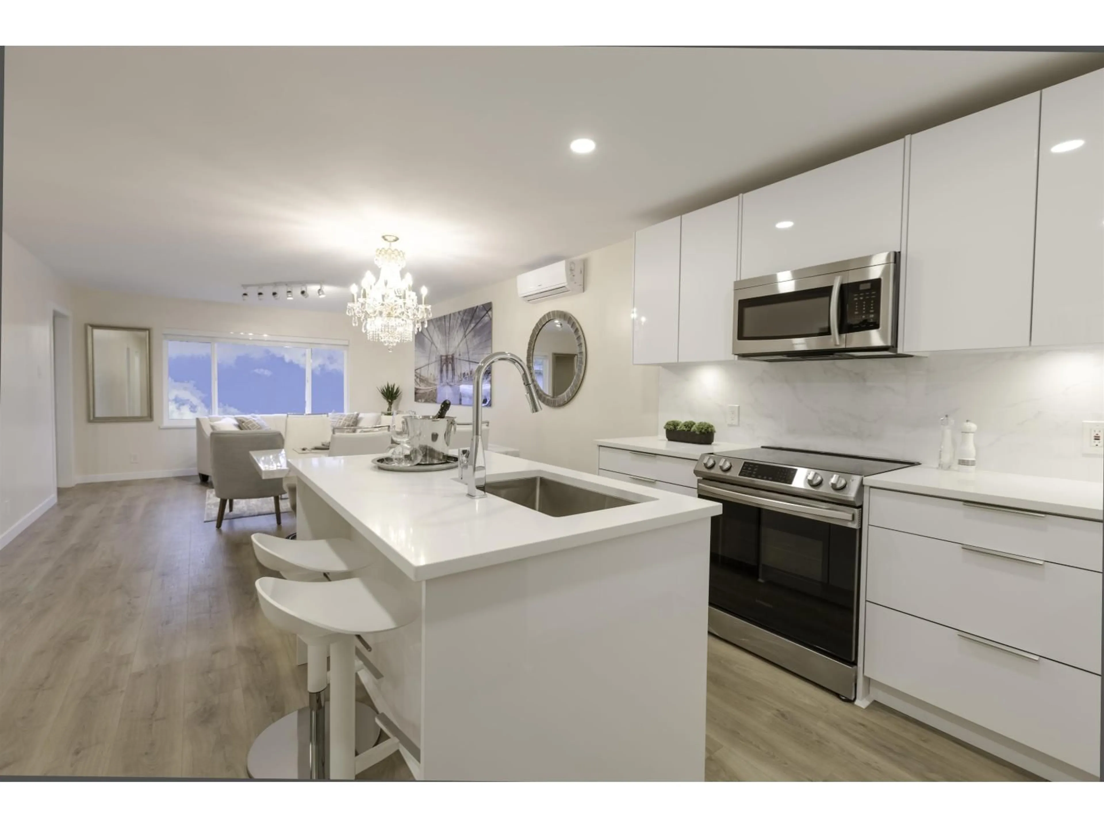 Open concept kitchen, unknown for 413 - 15739 FRASER HIGHWAY, Surrey British Columbia V4N1G9