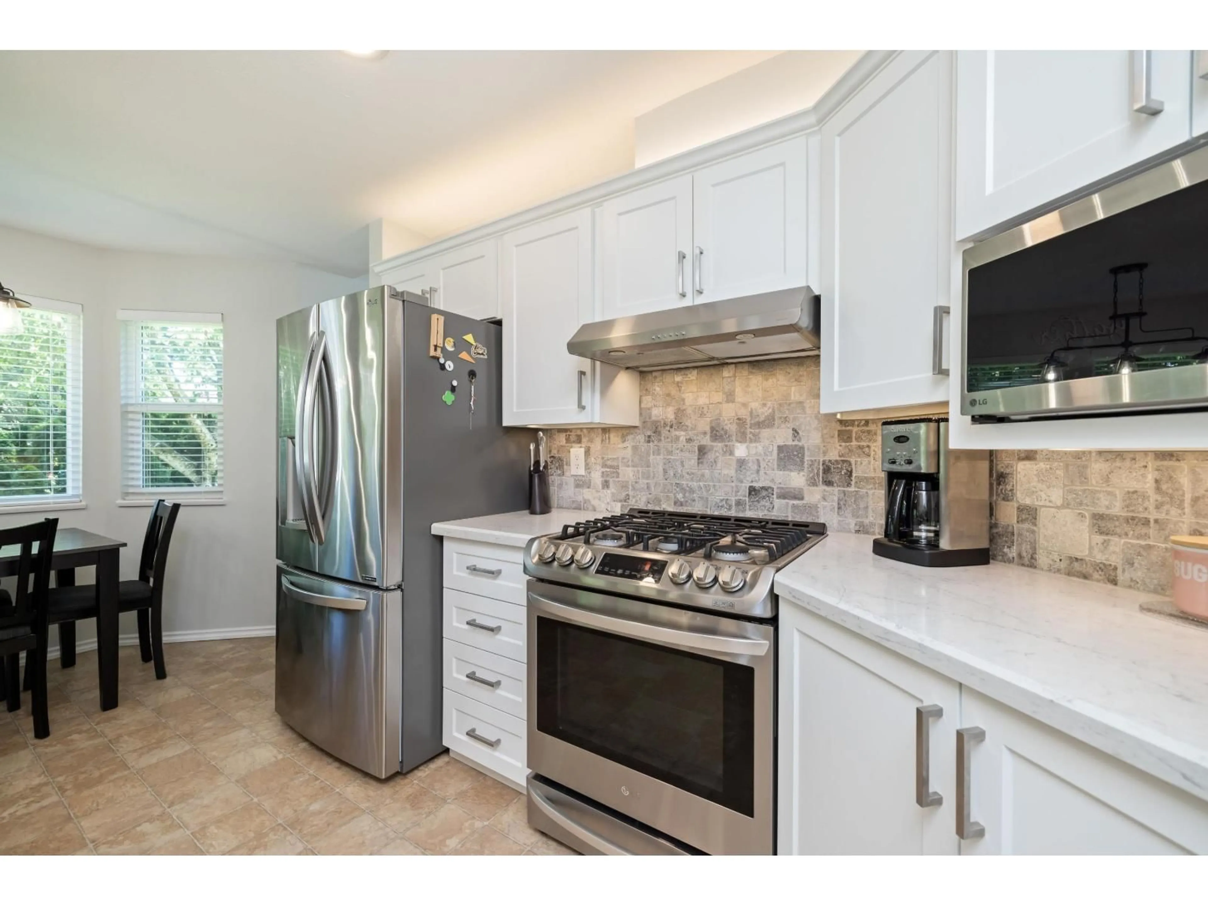 Open concept kitchen, ceramic/tile floor for 45257 RAVEN PLACE, Chilliwack British Columbia V2R2X1