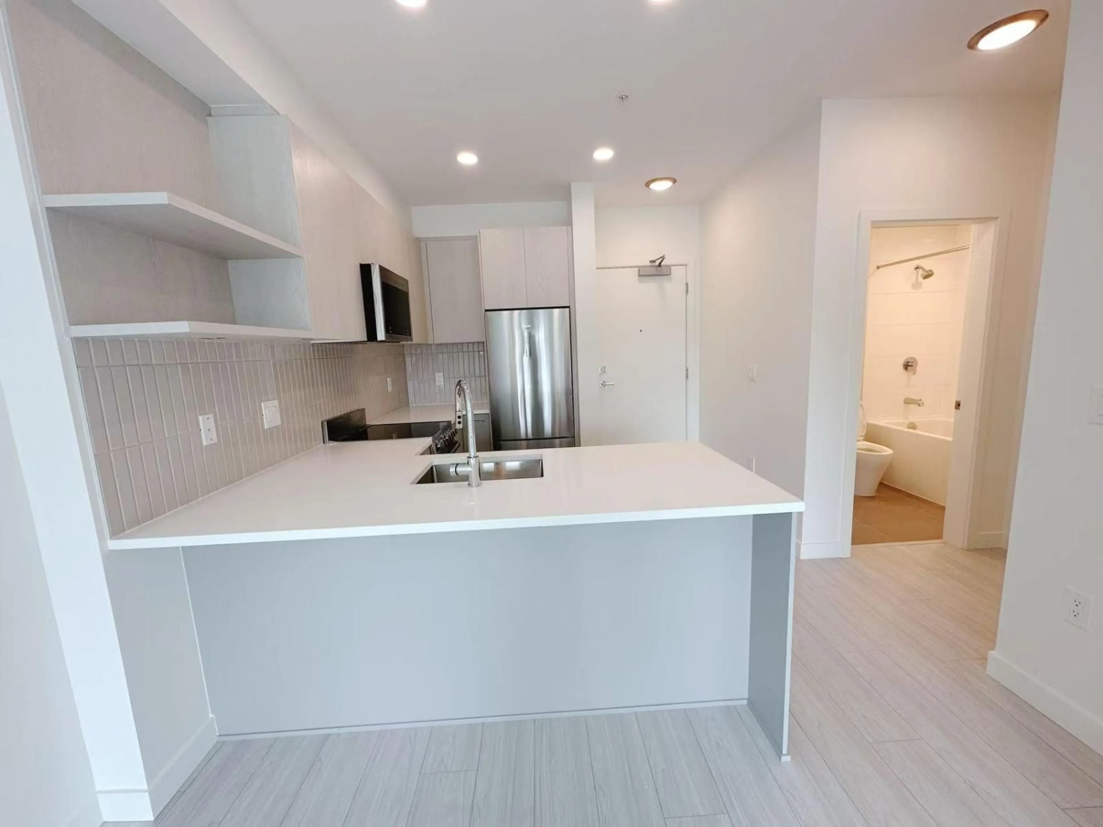 Open concept kitchen, unknown for 302 - 10777 138 STREET, Surrey British Columbia V3T0T5
