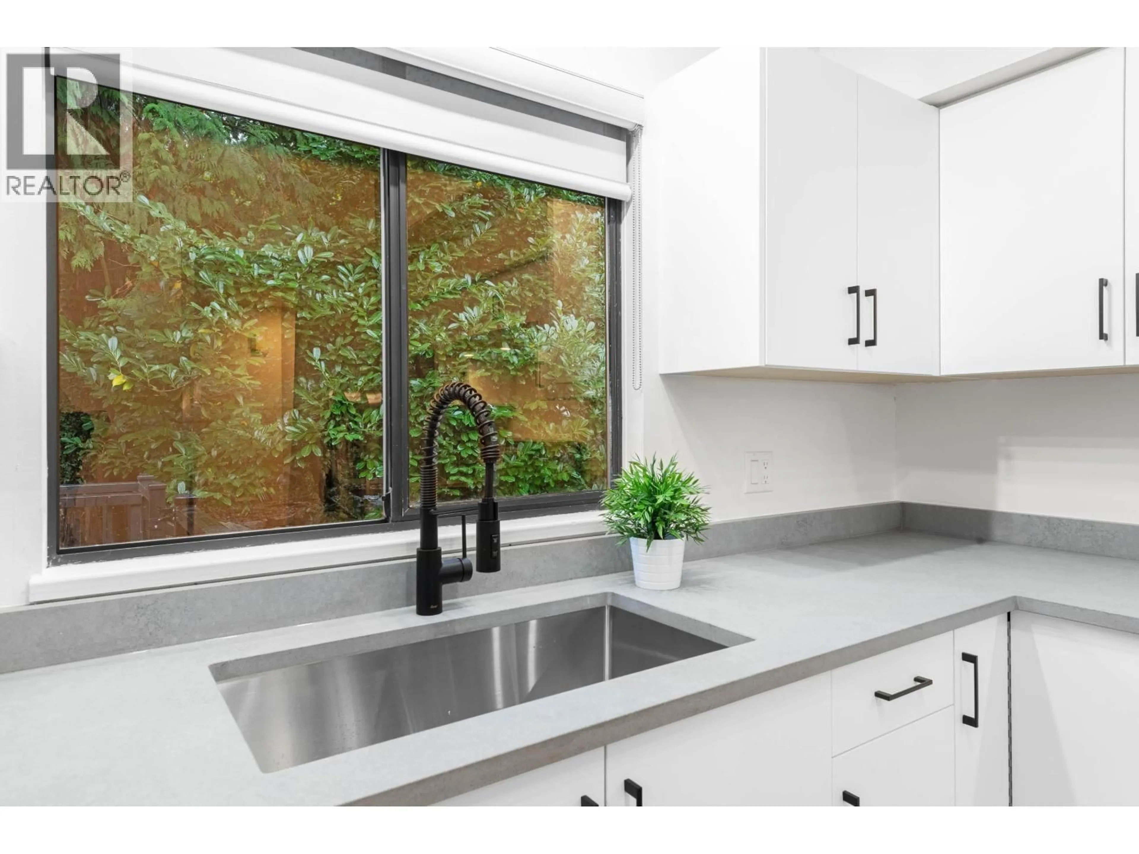 Contemporary kitchen, ceramic/tile floor for 1777 CALEDONIA AVENUE, North Vancouver British Columbia V7G1T5