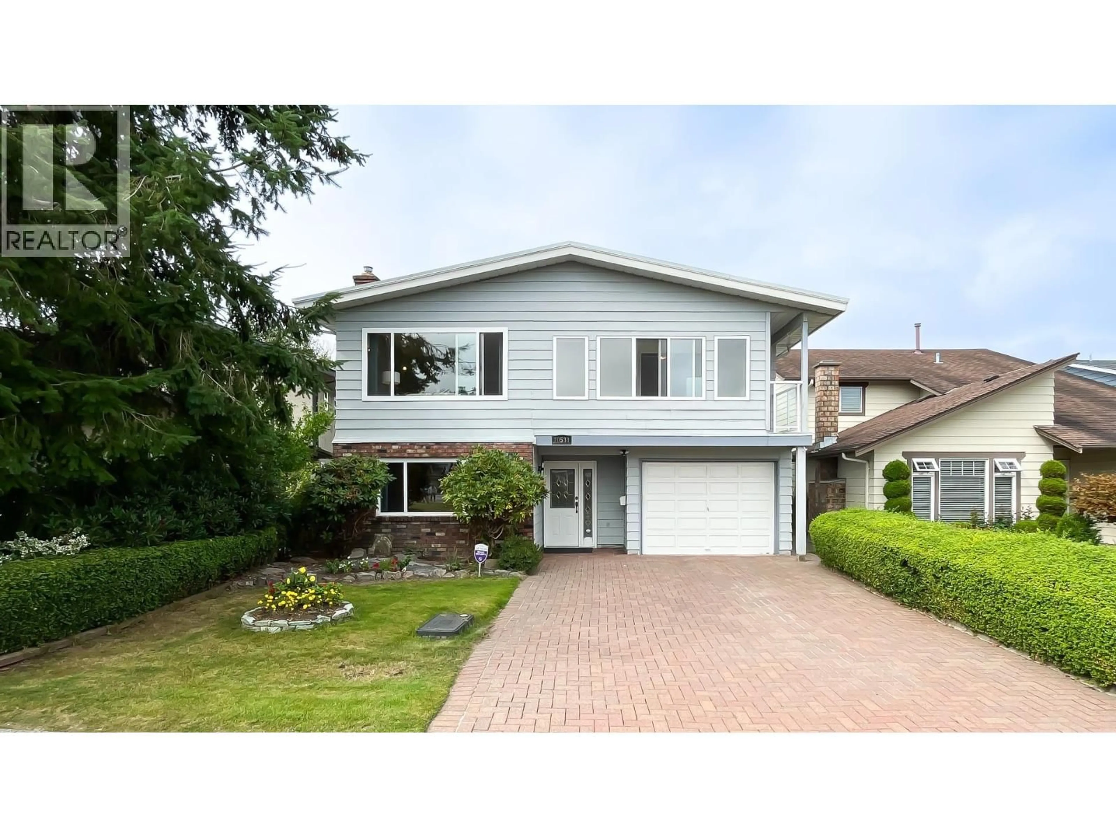 Home with vinyl exterior material, street for 10531 HOLLYBANK DRIVE, Richmond British Columbia V7E4S4