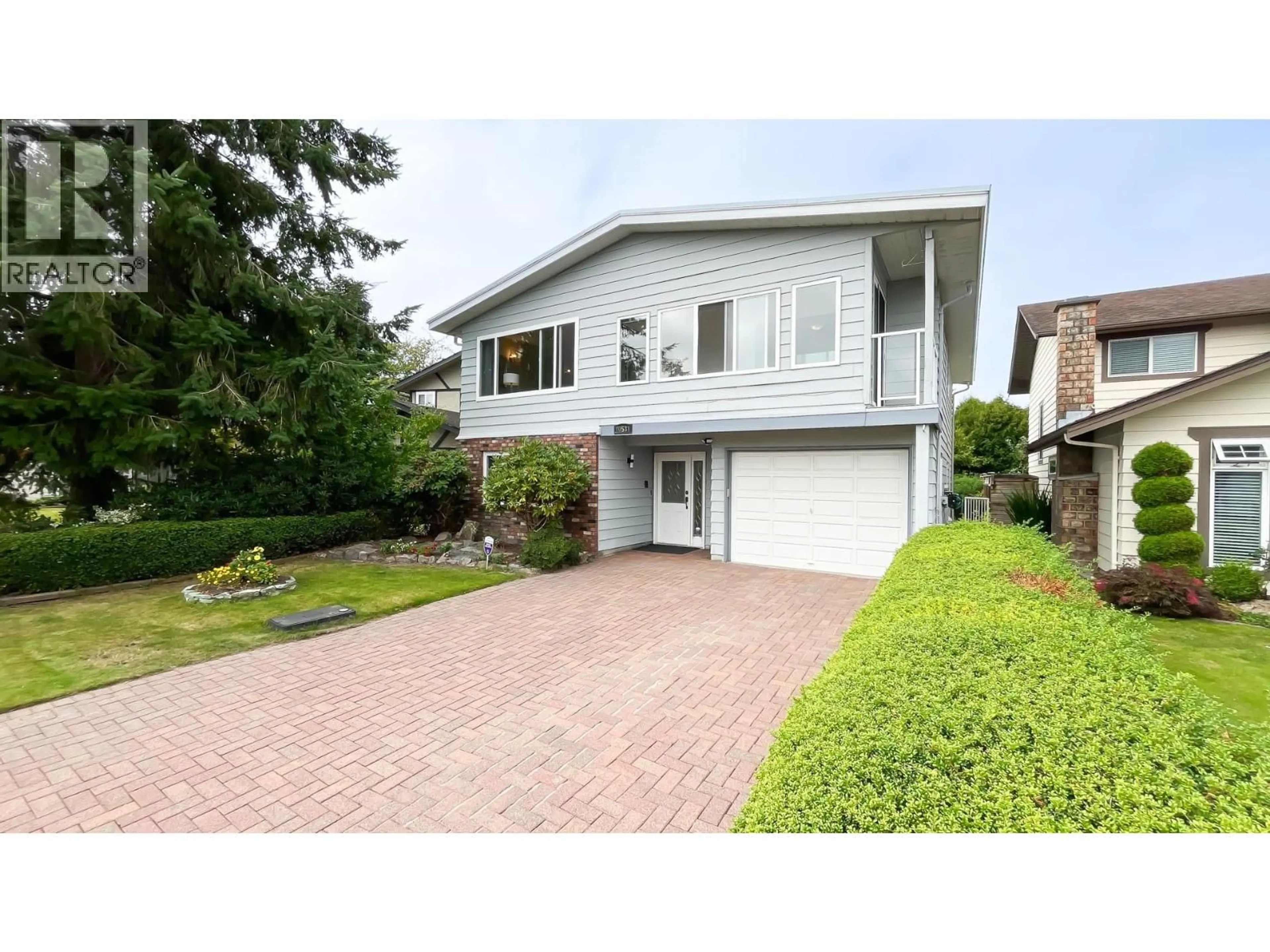 Home with vinyl exterior material, street for 10531 HOLLYBANK DRIVE, Richmond British Columbia V7E4S4