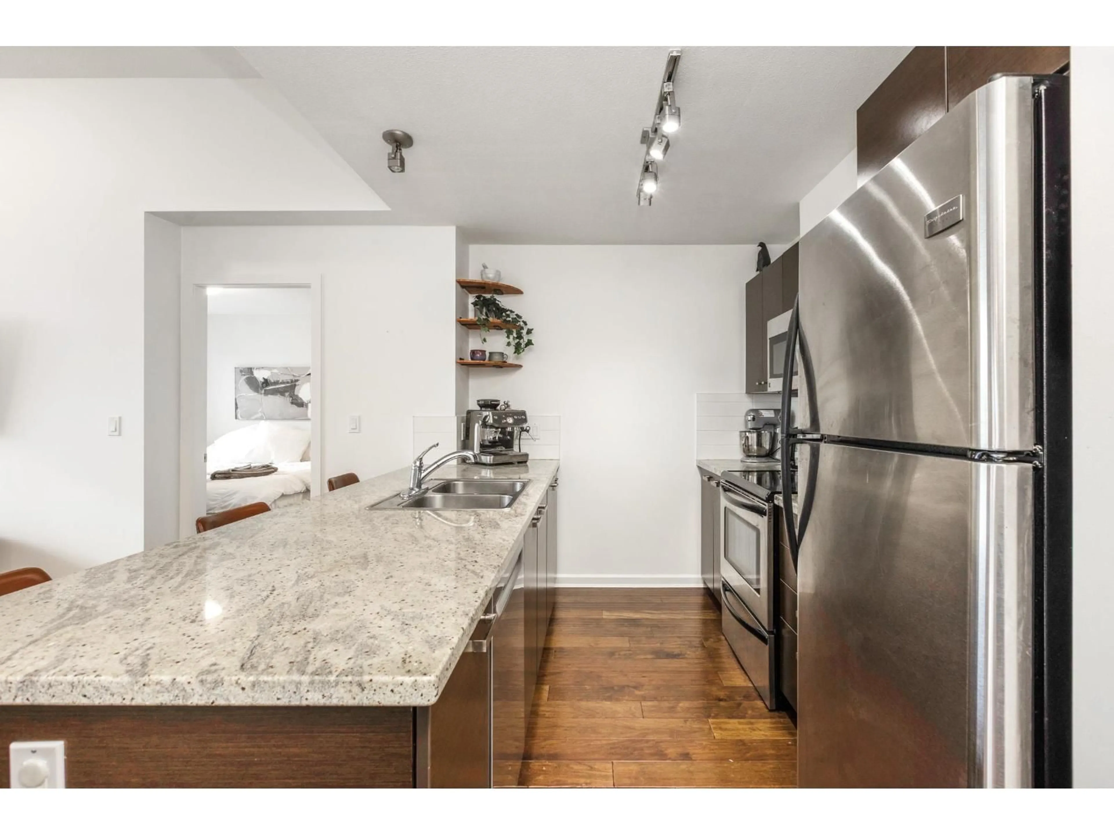 Open concept kitchen, unknown for 401 - 18755 68 AVENUE, Surrey British Columbia V4N0Z9