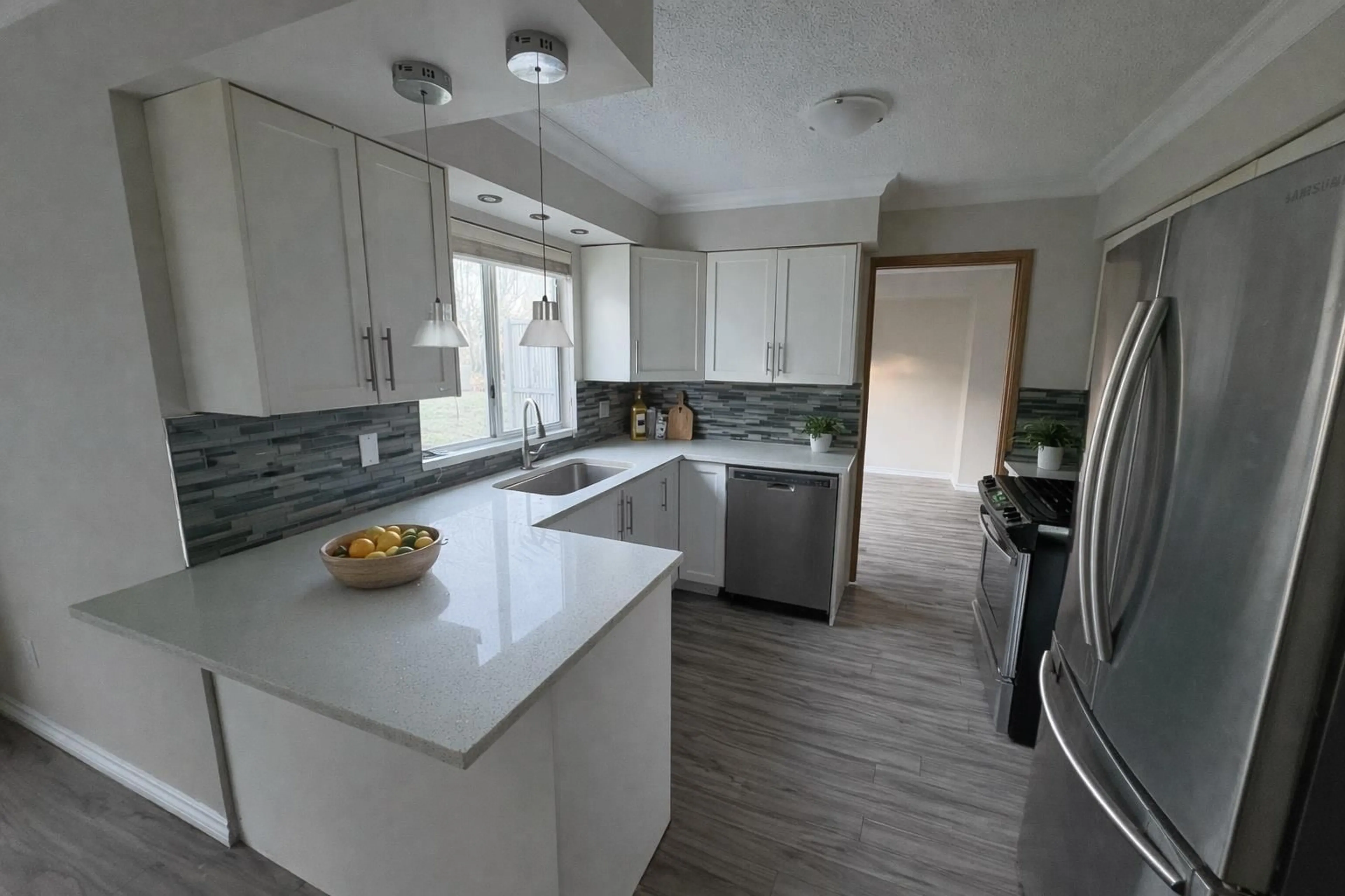 Open concept kitchen, ceramic/tile floor for 11486 81A AVENUE, Delta British Columbia V4C2A6