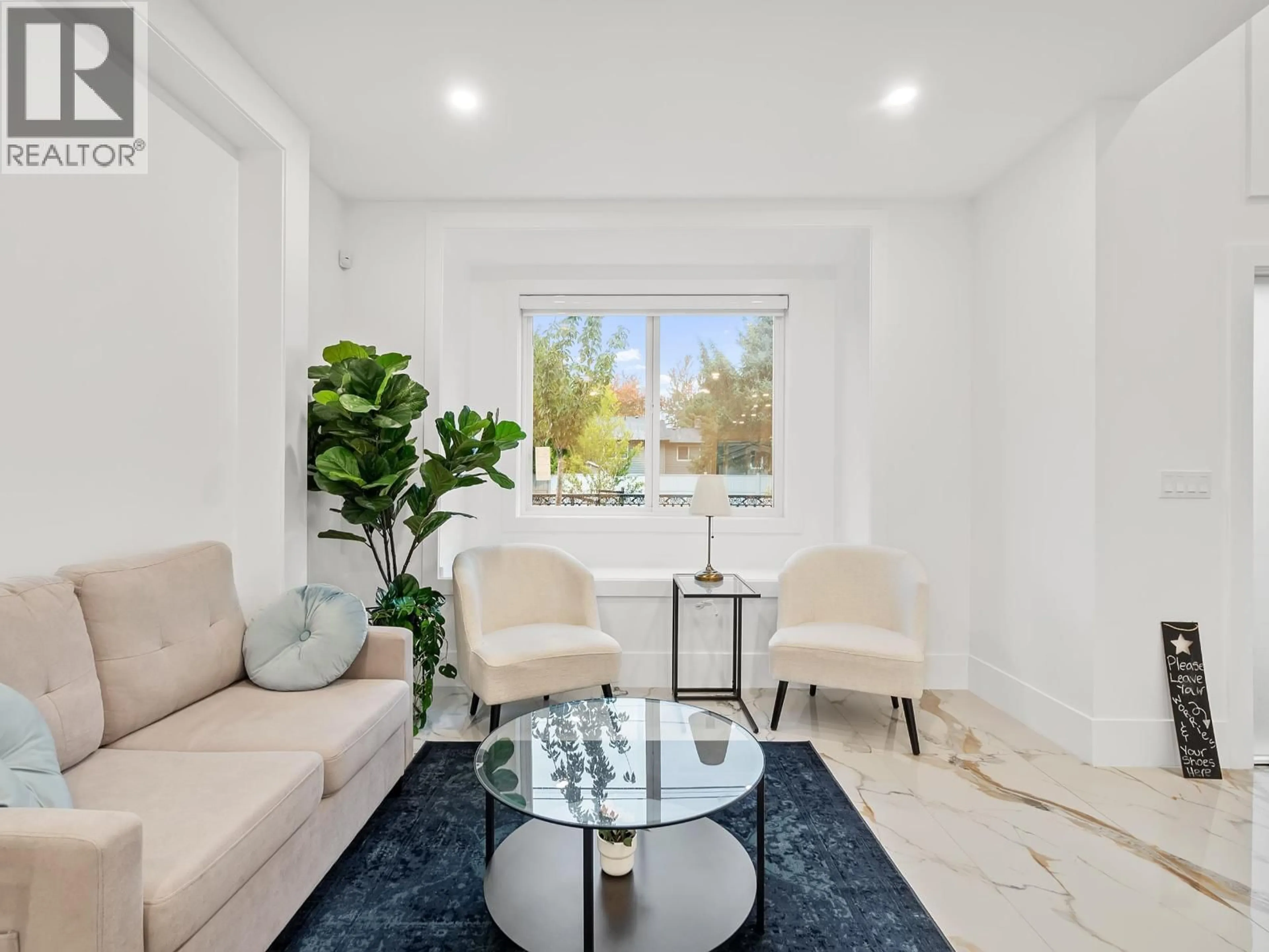 Living room with furniture, ceramic/tile floor for 10655 NO. 1 ROAD, Richmond British Columbia V7E2E8