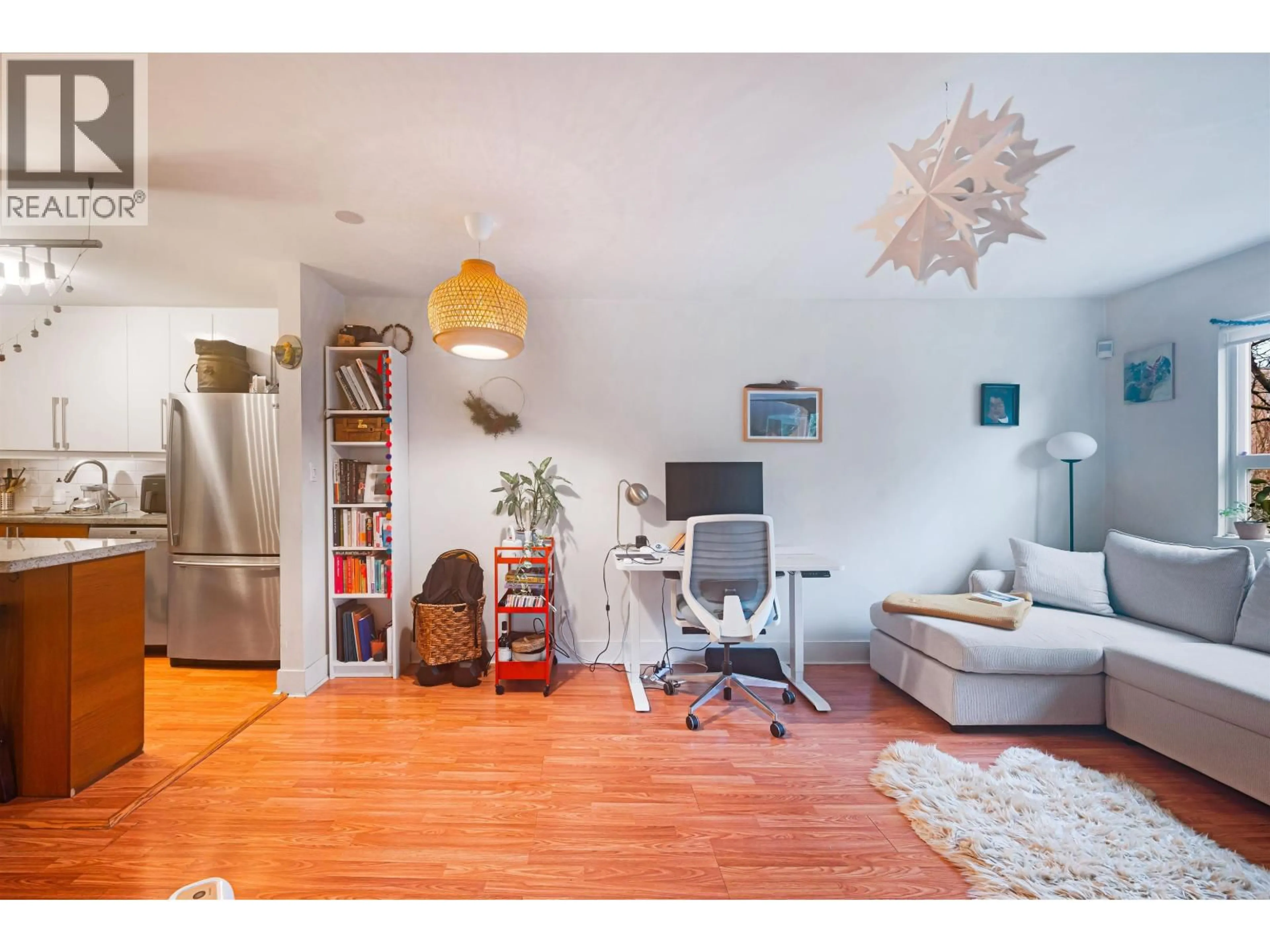 Living room with furniture, wood/laminate floor for 205 - 111 10TH AVENUE, Vancouver British Columbia V5Y1R7