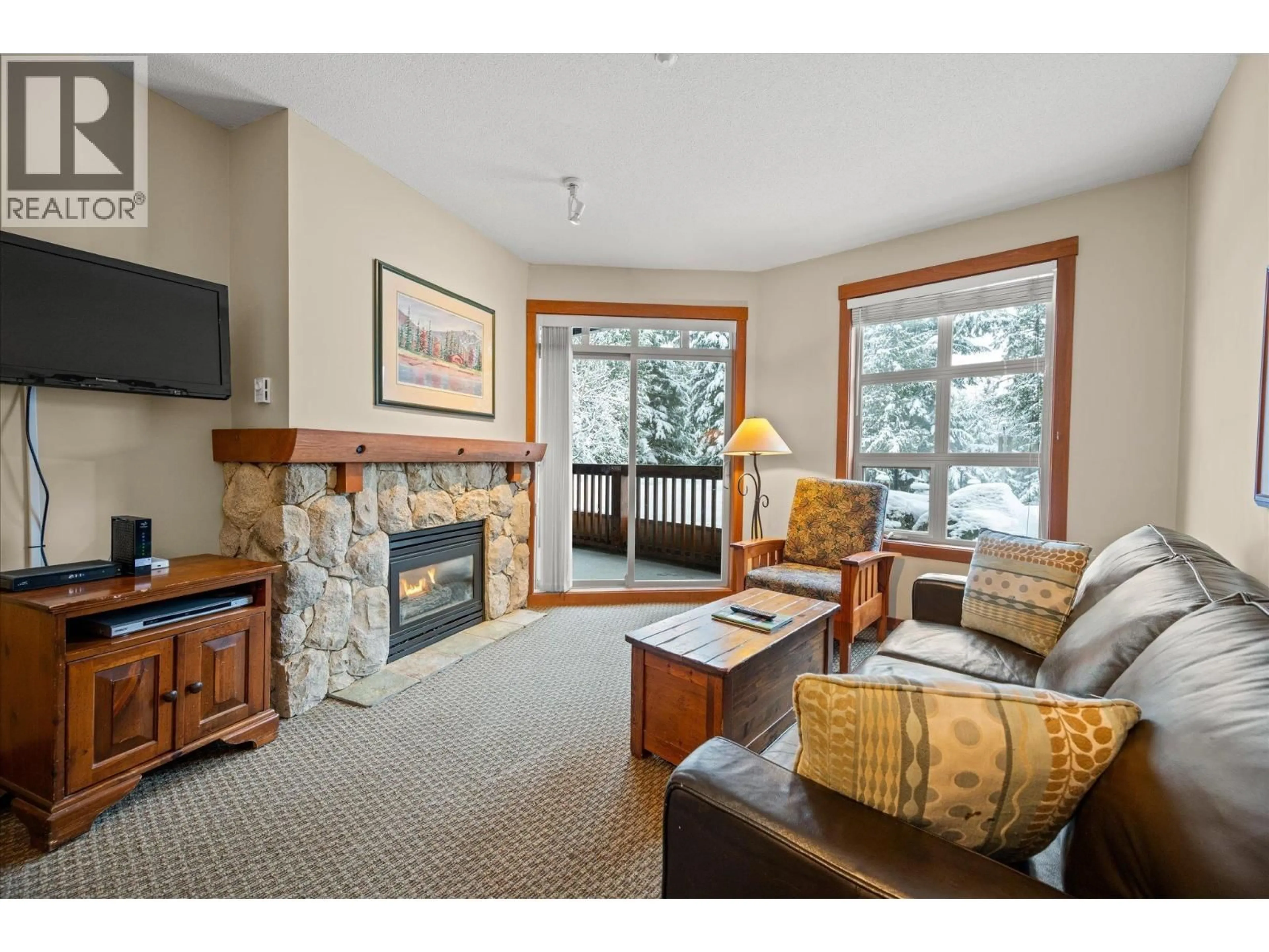 Living room with furniture, unknown for 212 - 4660 BLACKCOMB WAY, Whistler British Columbia V8E0Y8