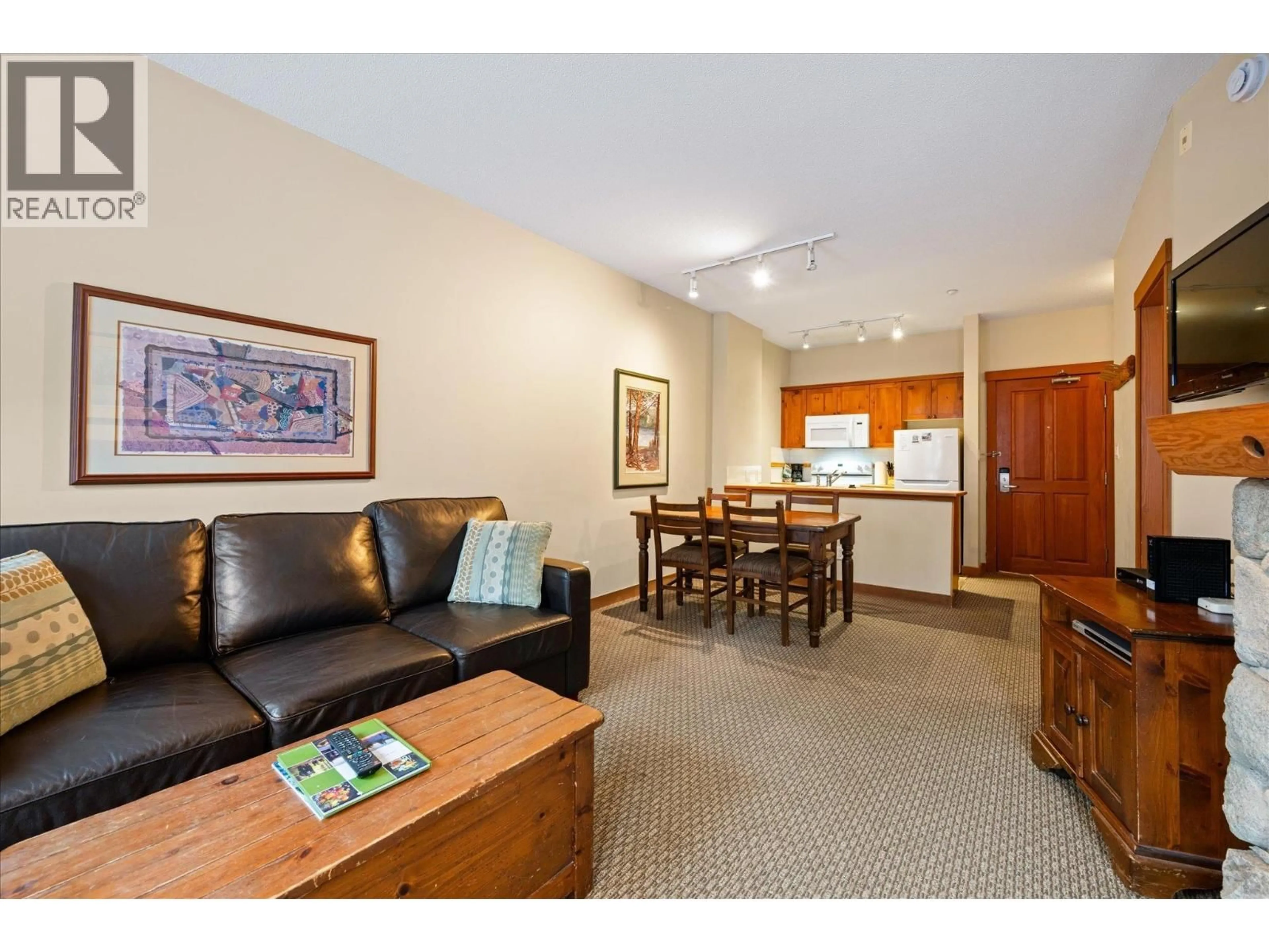 Living room with furniture, unknown for 212 - 4660 BLACKCOMB WAY, Whistler British Columbia V8E0Y8