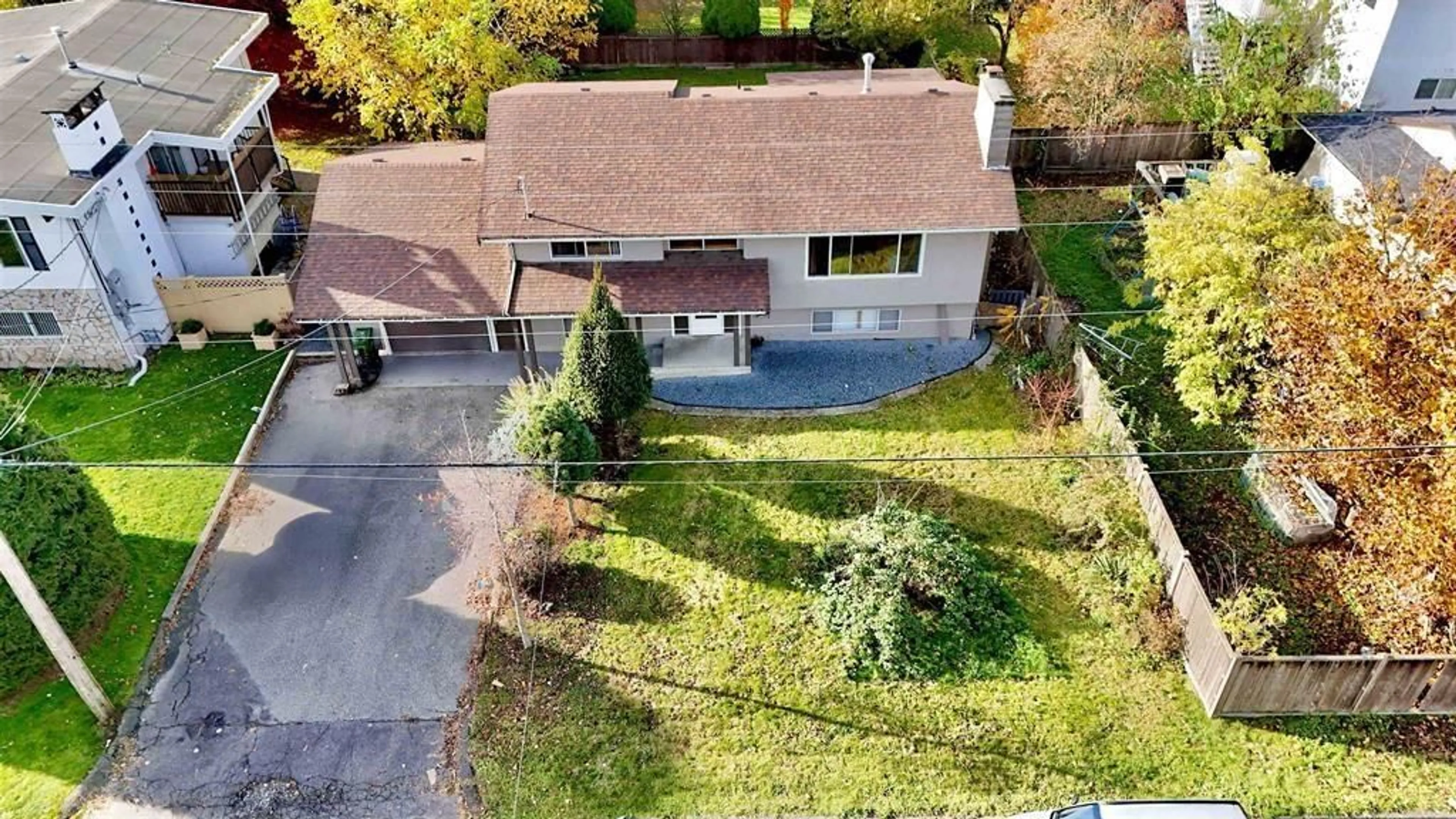 A pic from outside/outdoor area/front of a property/back of a property/a pic from drone, street for 9161 HAZEL STREET, Chilliwack British Columbia V2P5N5