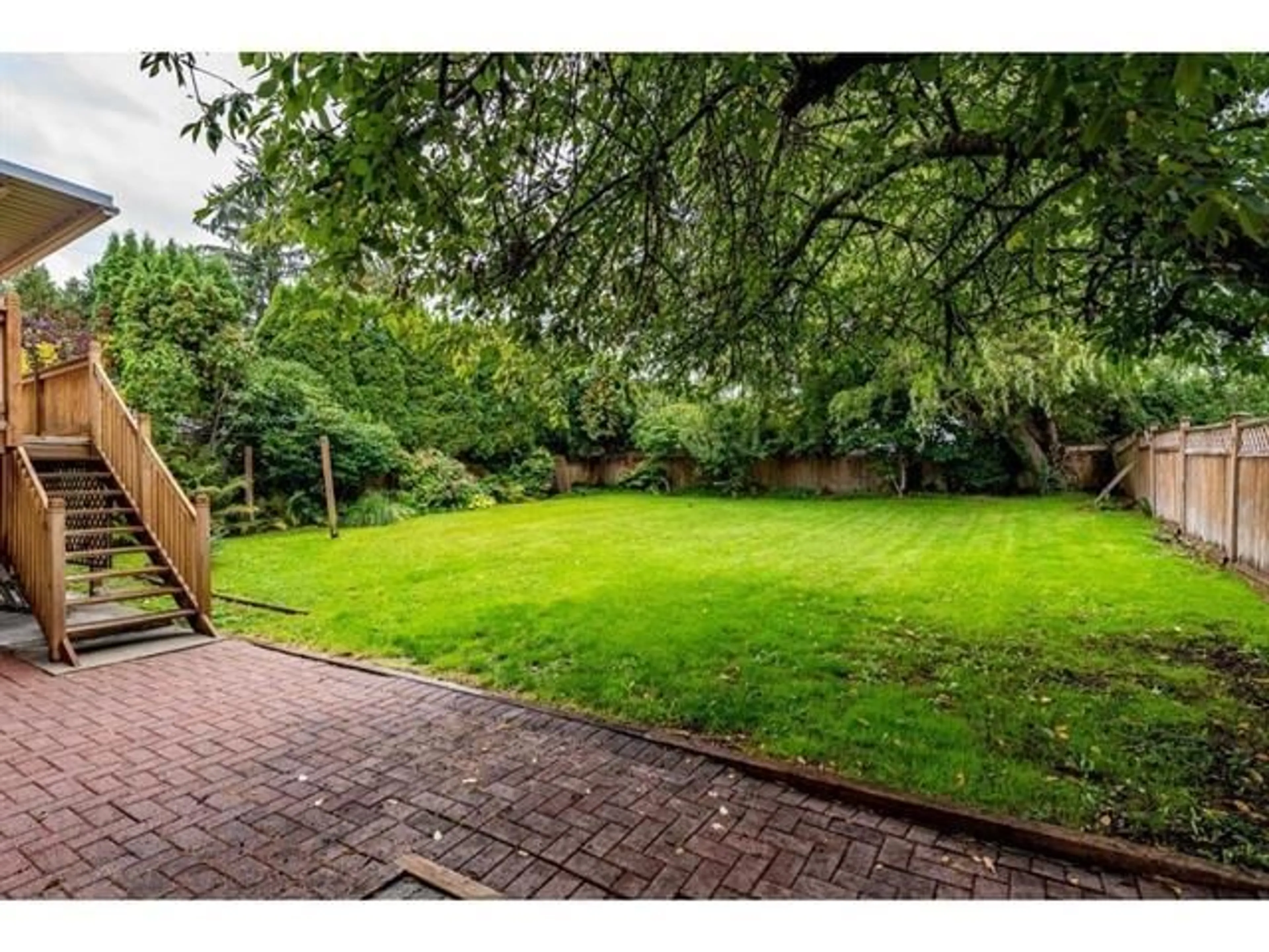 A pic from outside/outdoor area/front of a property/back of a property/a pic from drone, forest/trees view for 4815 201 STREET, Langley British Columbia V3A5V6