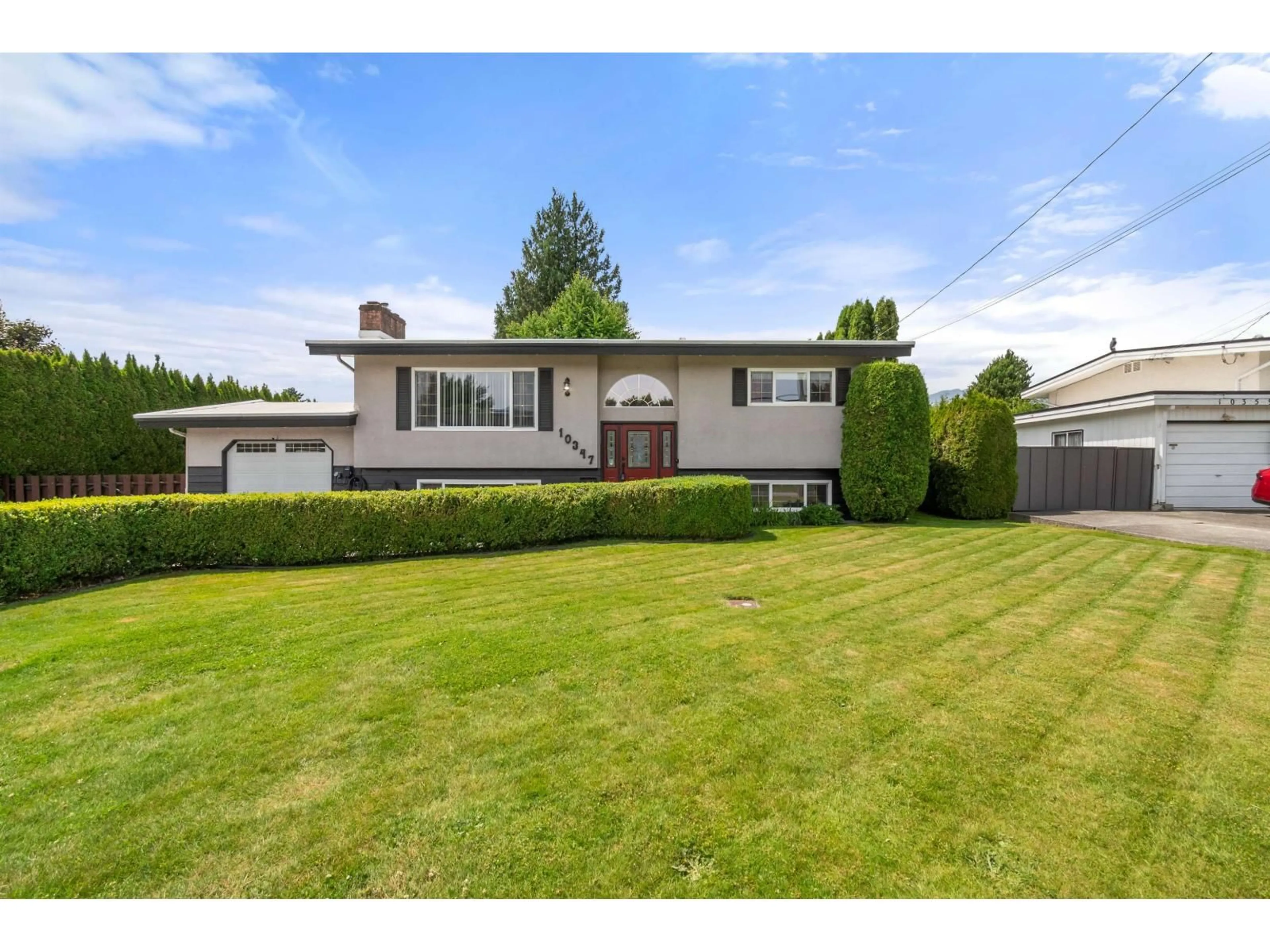 A pic from outside/outdoor area/front of a property/back of a property/a pic from drone, street for 10347 KENT ROAD, Chilliwack British Columbia V2P5X9