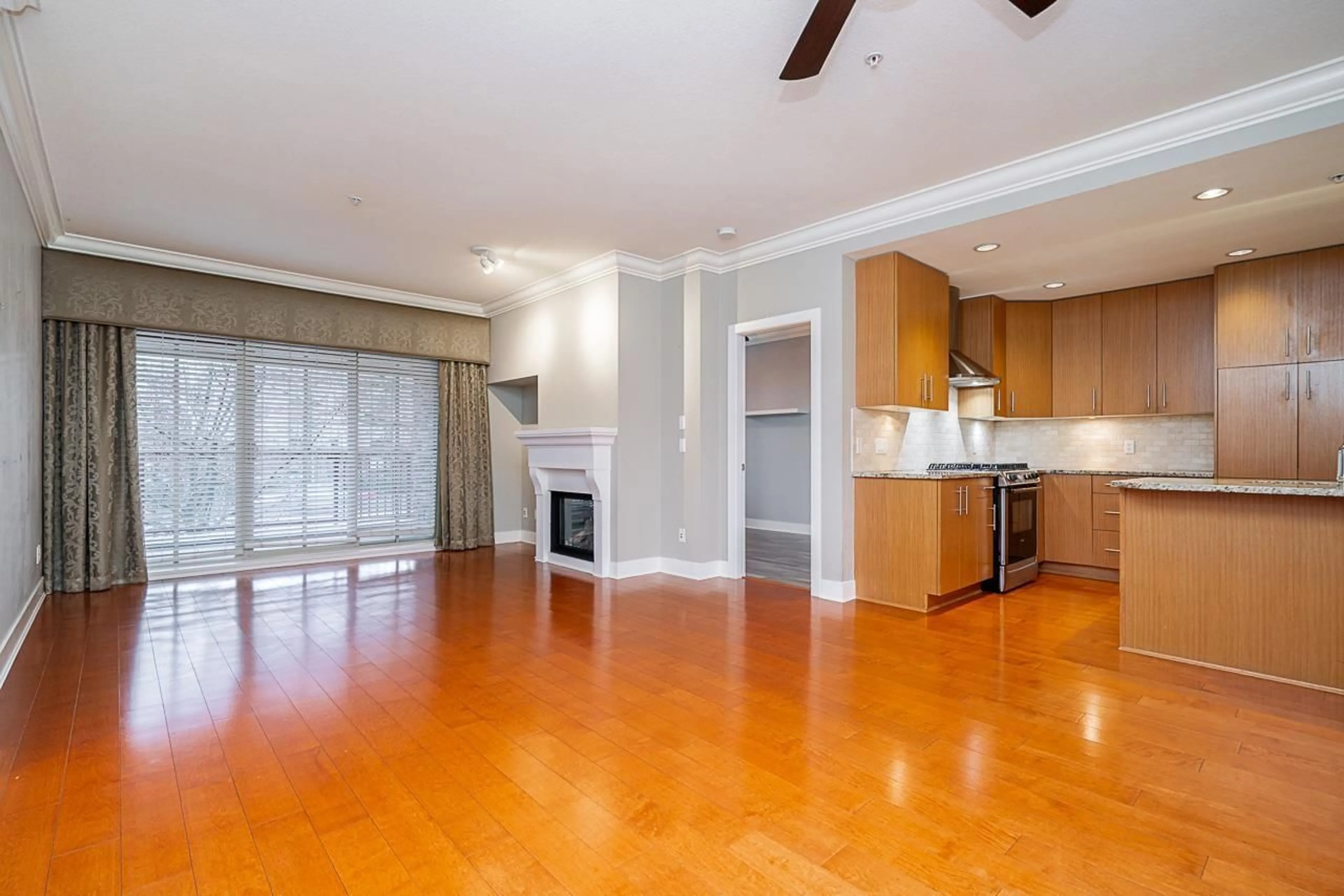 Open concept kitchen, wood/laminate floor for 207 - 16421 64 AVENUE, Surrey British Columbia V3S6V7