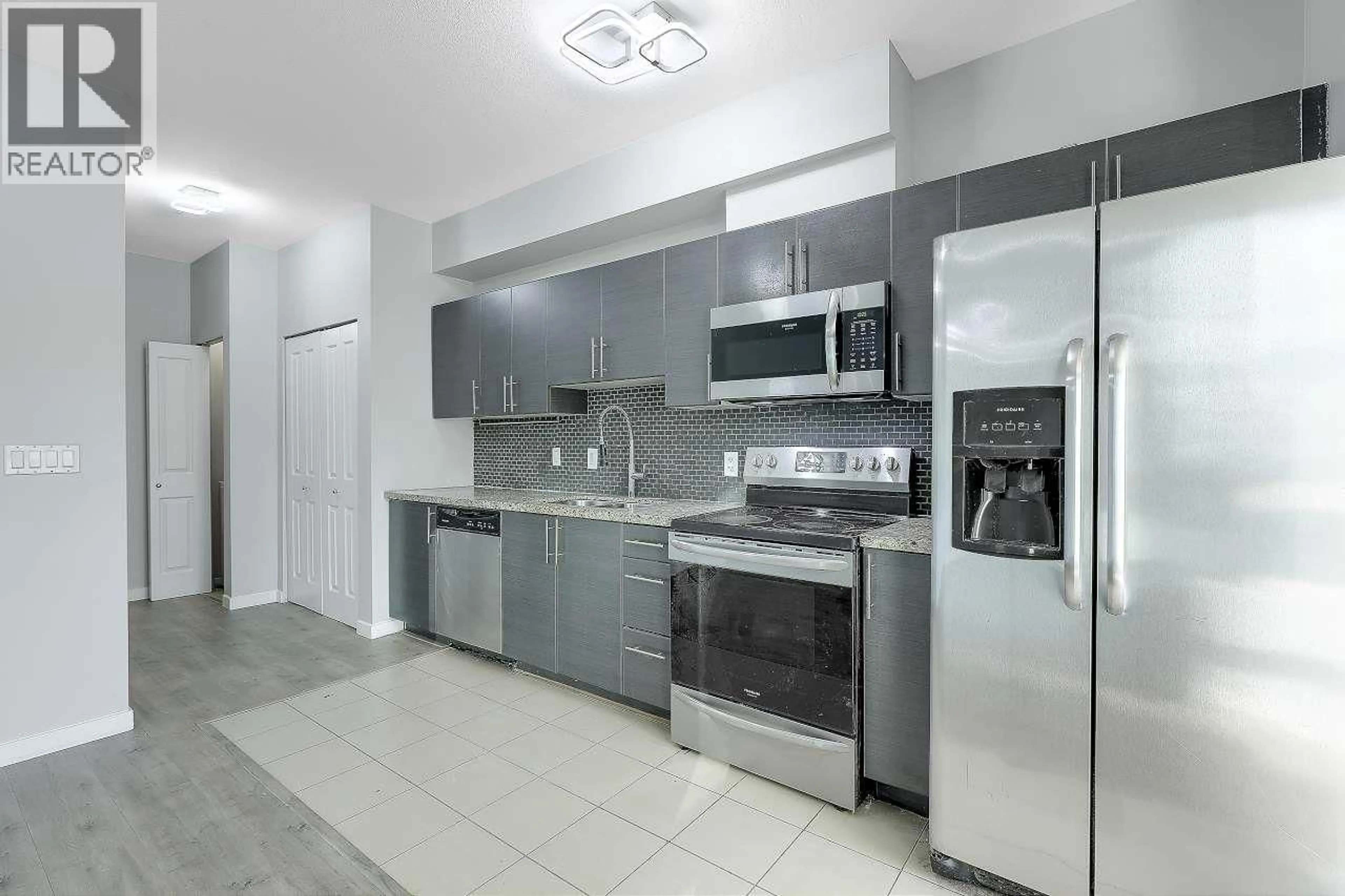 Standard kitchen, ceramic/tile floor for 212 - 2239 KINGSWAY WAY, Vancouver British Columbia V5N0E5