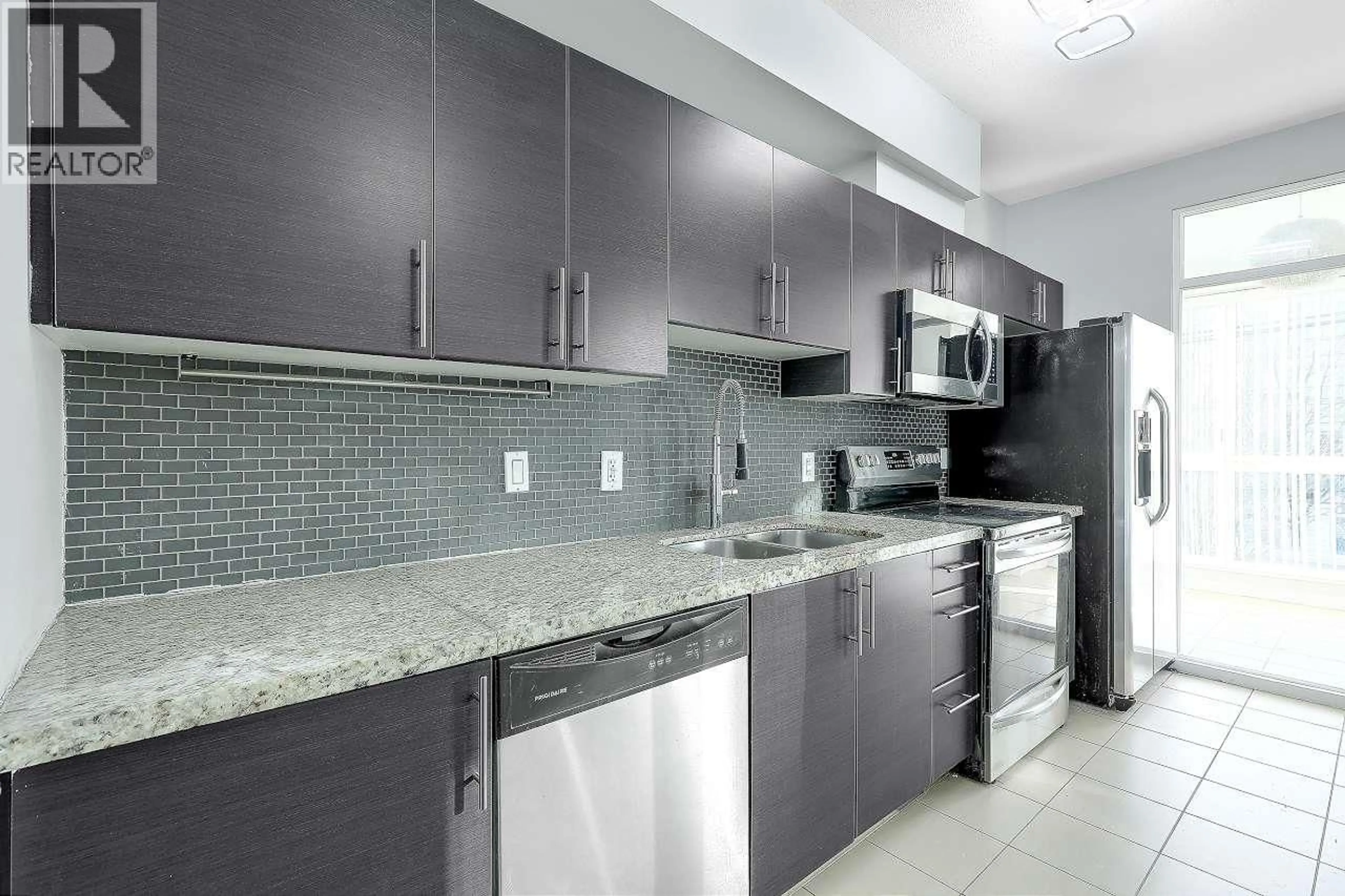 Standard kitchen, ceramic/tile floor for 212 - 2239 KINGSWAY WAY, Vancouver British Columbia V5N0E5