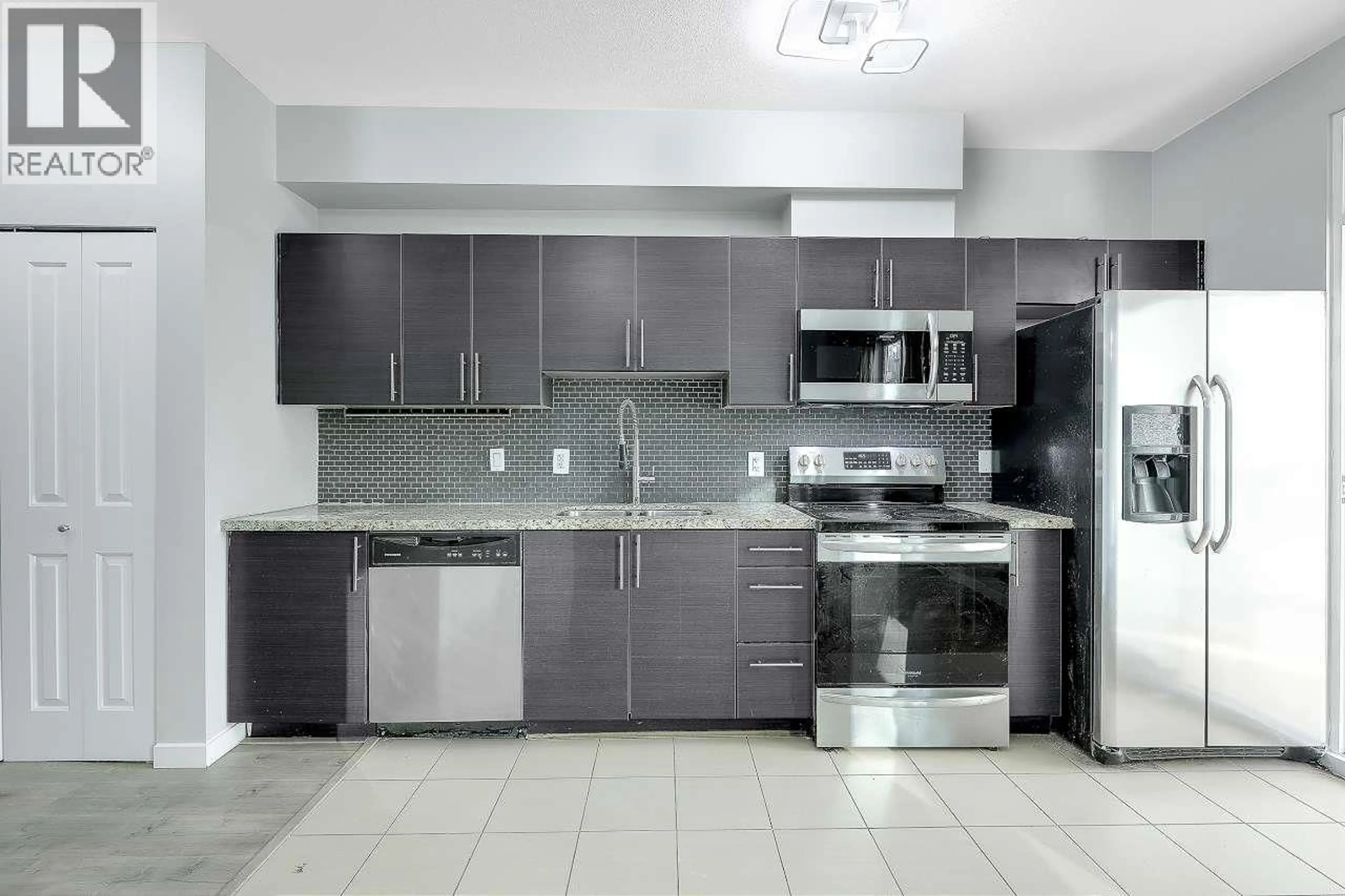 Standard kitchen, ceramic/tile floor for 212 - 2239 KINGSWAY WAY, Vancouver British Columbia V5N0E5