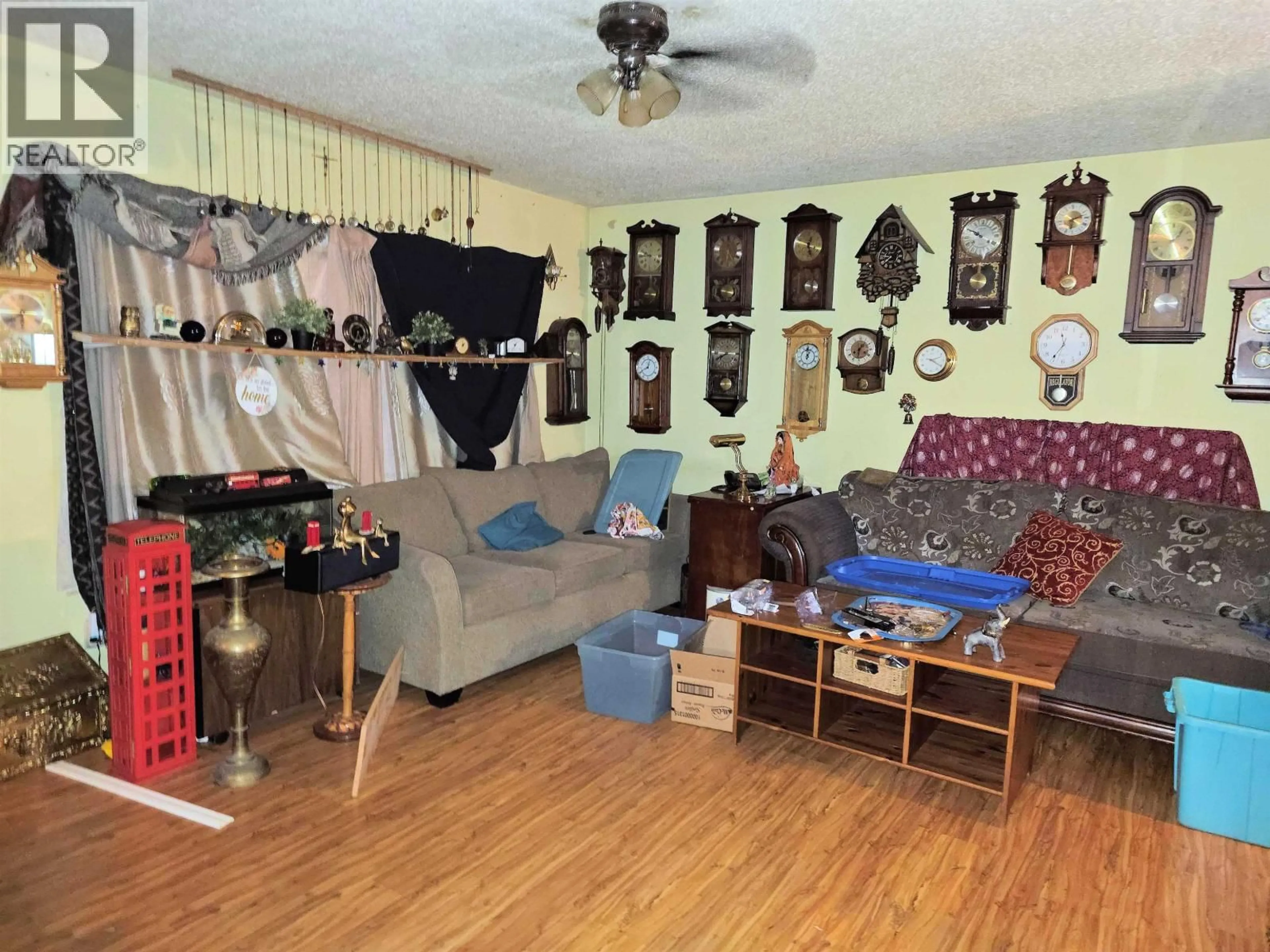 Living room with furniture, wood/laminate floor for 21881 TAYLOR AVENUE, Topley British Columbia V0J2Y0