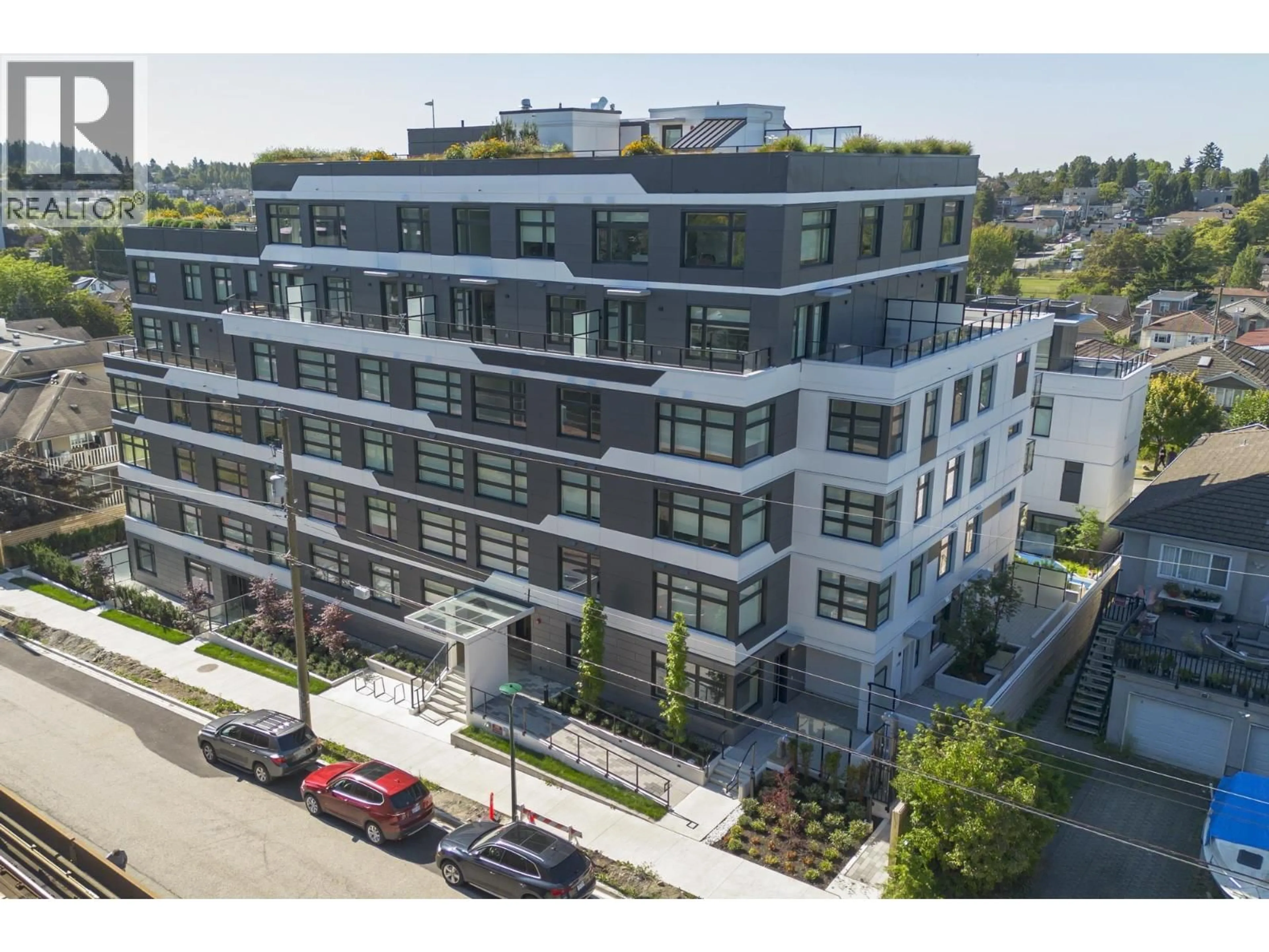 A pic from outside/outdoor area/front of a property/back of a property/a pic from drone, building for 206 - 3264 VANNESS AVENUE, Vancouver British Columbia V5R0L5
