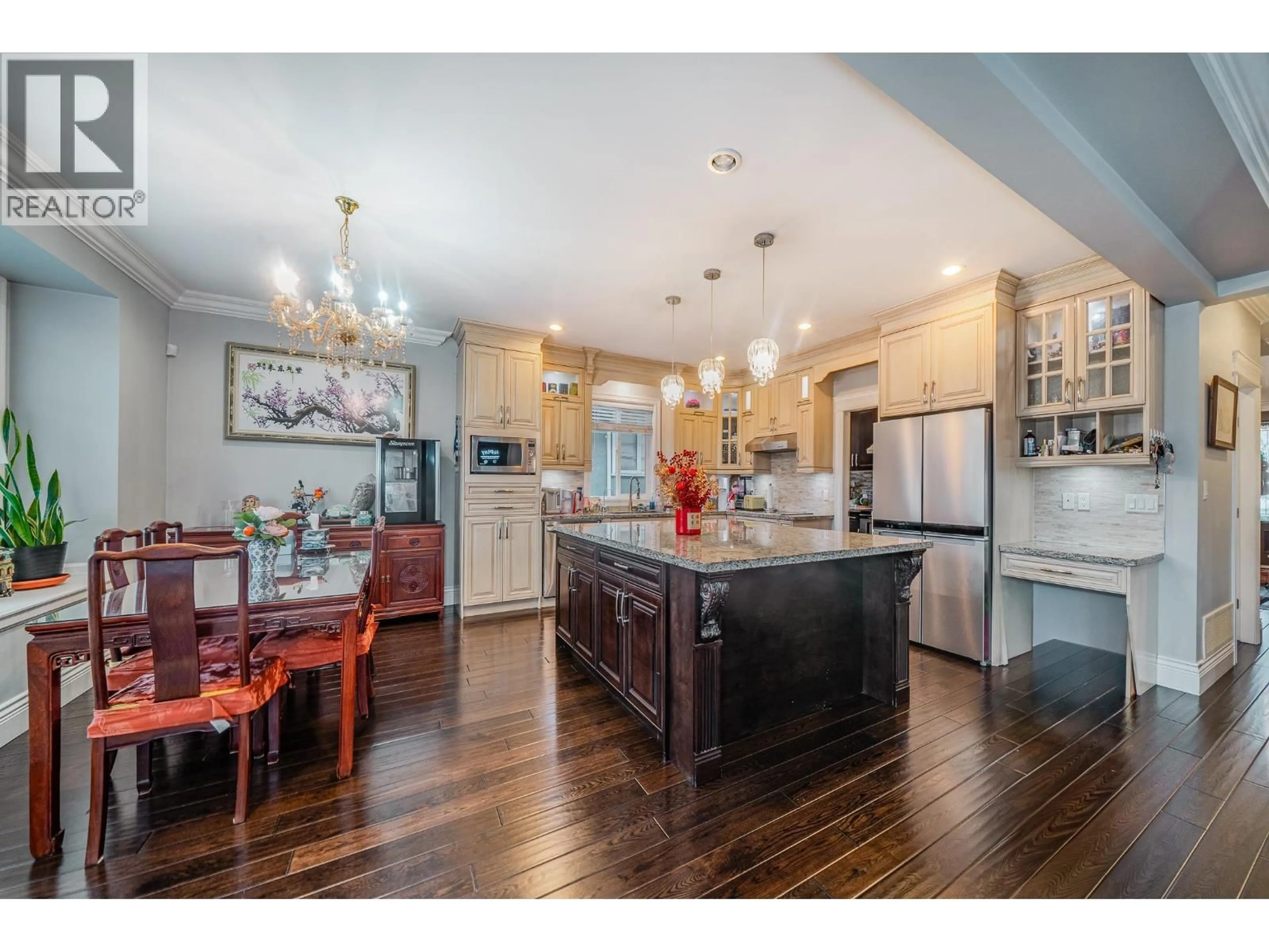 Open concept kitchen, wood/laminate floor for 5007 HARDWICK STREET, Burnaby British Columbia V5G1P8