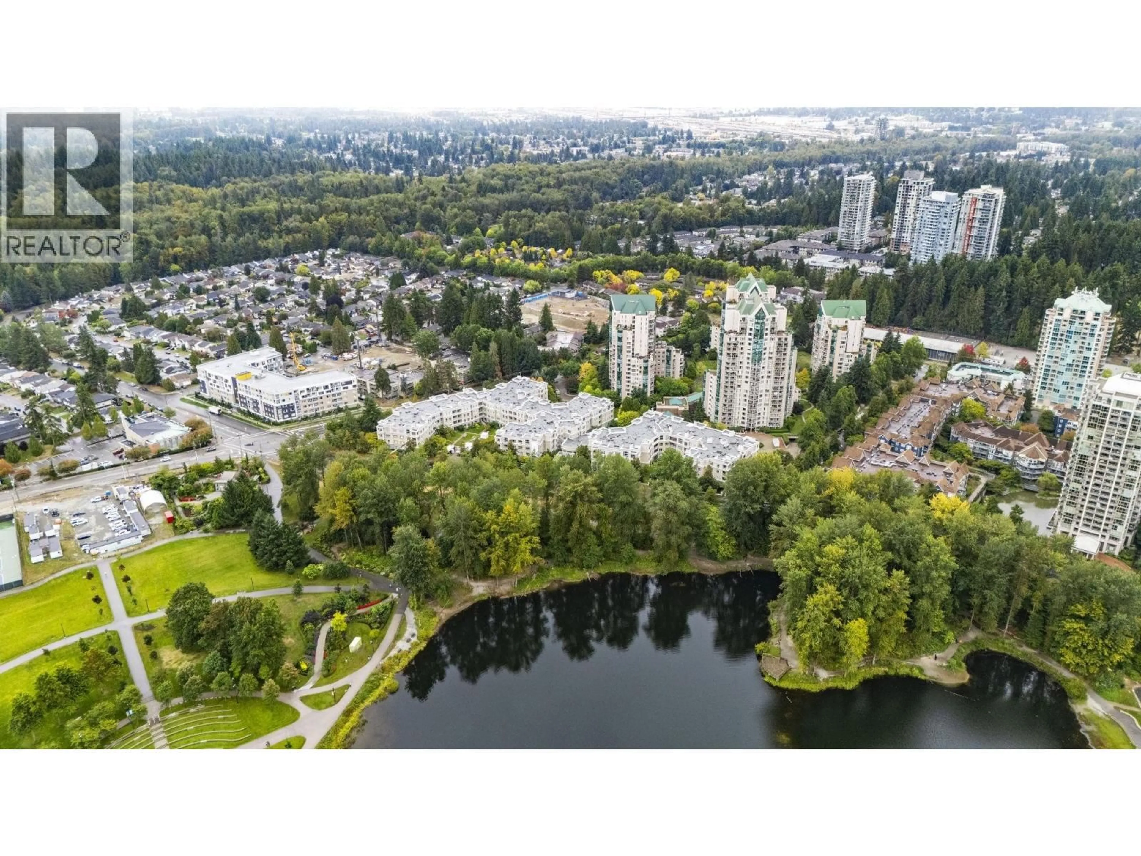 A pic from outside/outdoor area/front of a property/back of a property/a pic from drone, water/lake/river/ocean view for 130 - 3098 GUILDFORD WAY, Coquitlam British Columbia V3B7W8