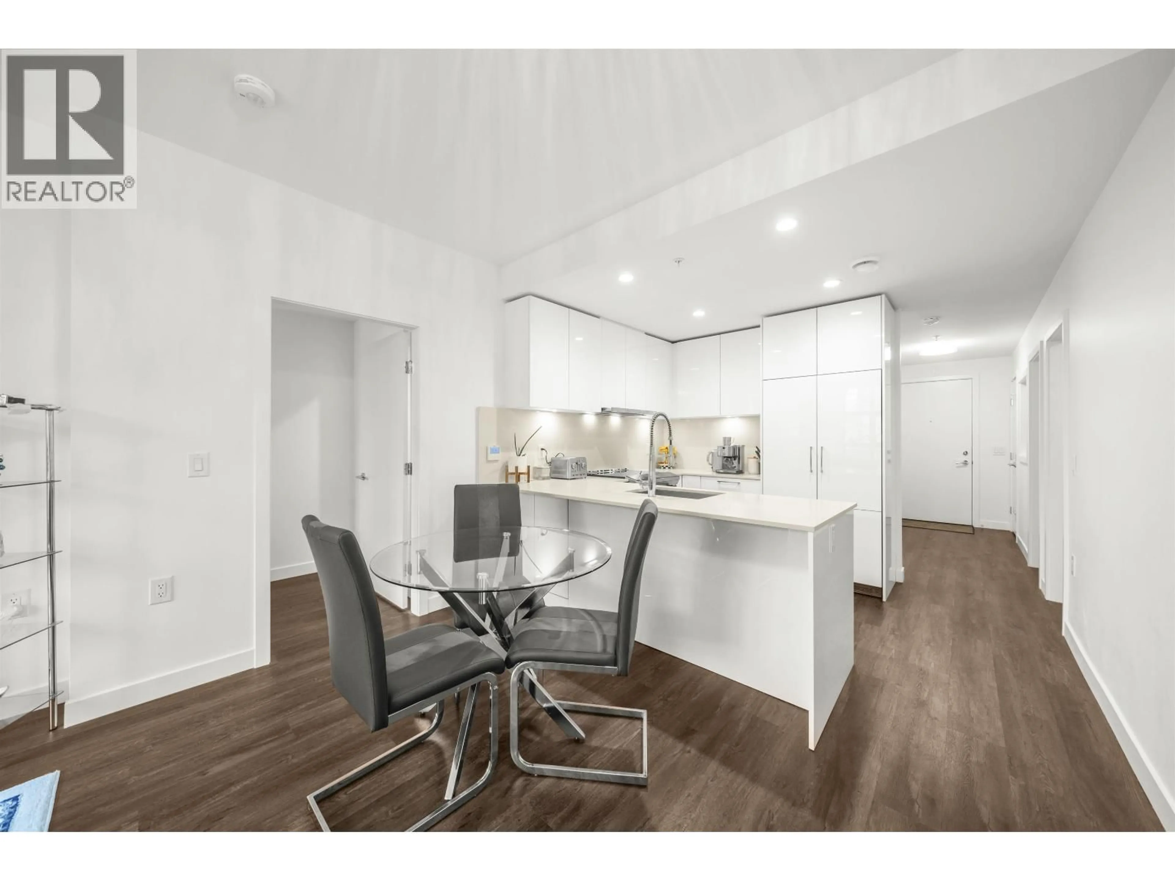 Open concept kitchen, wood/laminate floor for 201 - 2446 SHAUGHNESSY STREET, Port Coquitlam British Columbia V3C3E5