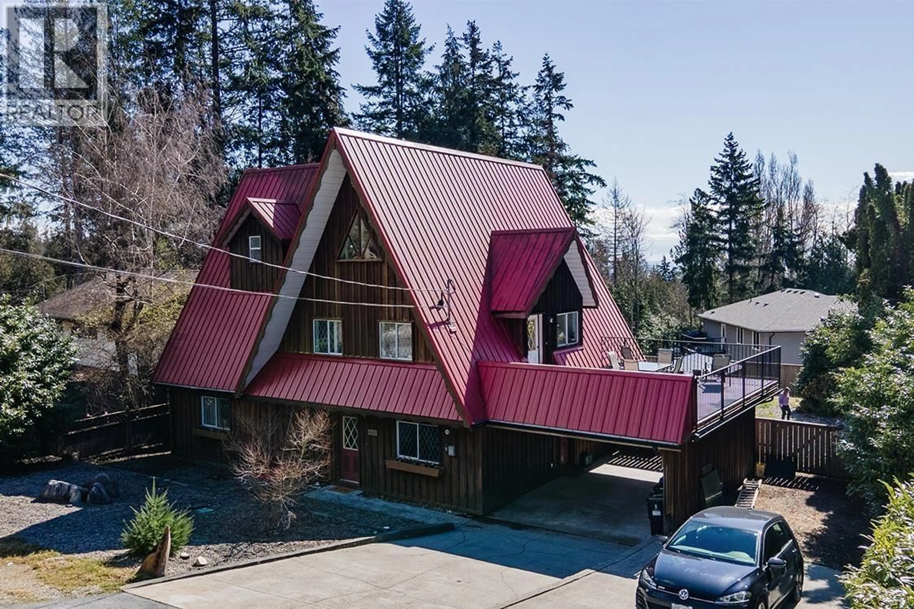 A pic from outside/outdoor area/front of a property/back of a property/a pic from drone, mountain view for 6563 ANCHOR PLACE, Sechelt British Columbia V7Z0N3