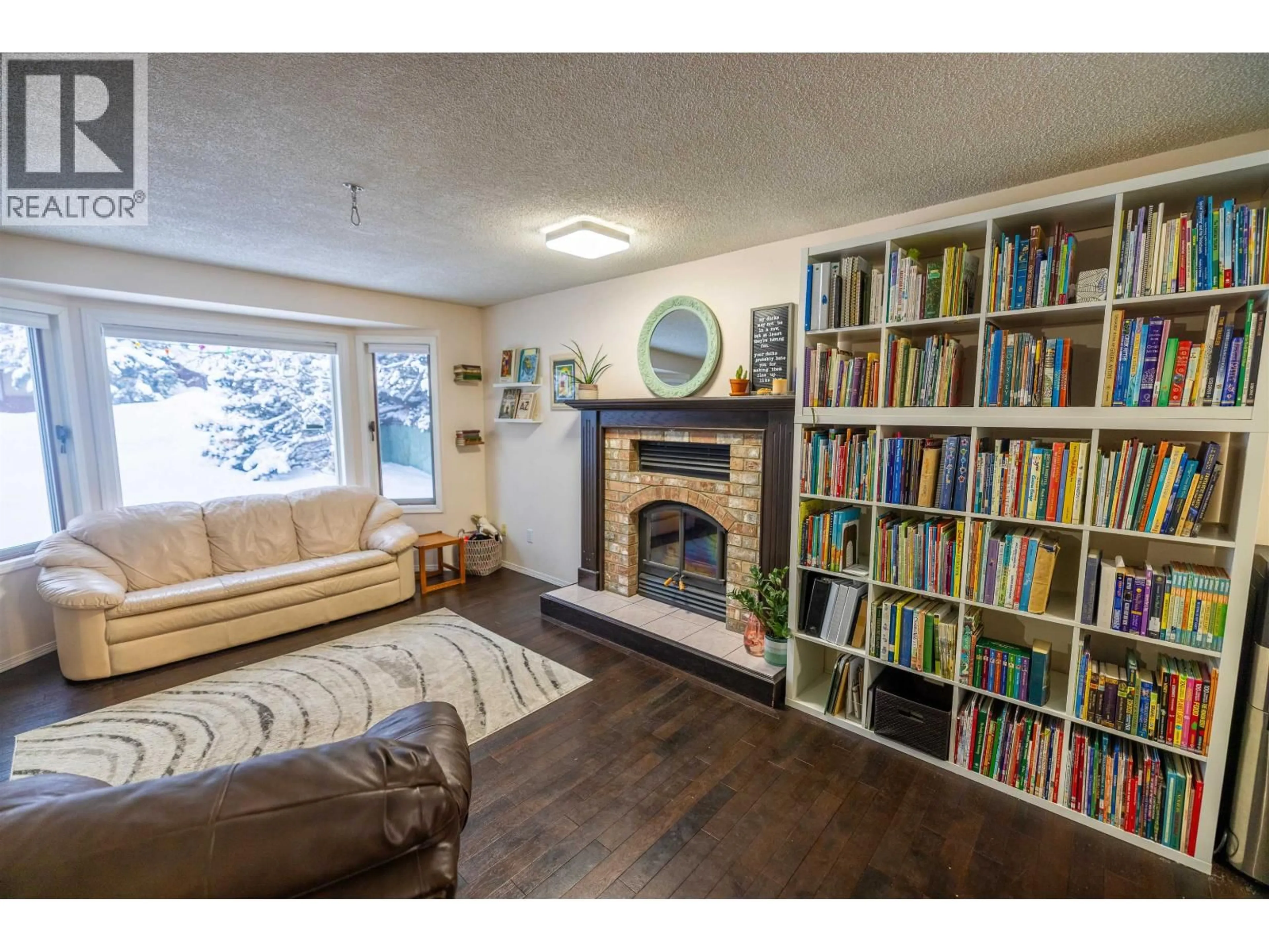 Living room with furniture, wood/laminate floor for 3178 WALLACE CRESCENT, Prince George British Columbia V2K3R6