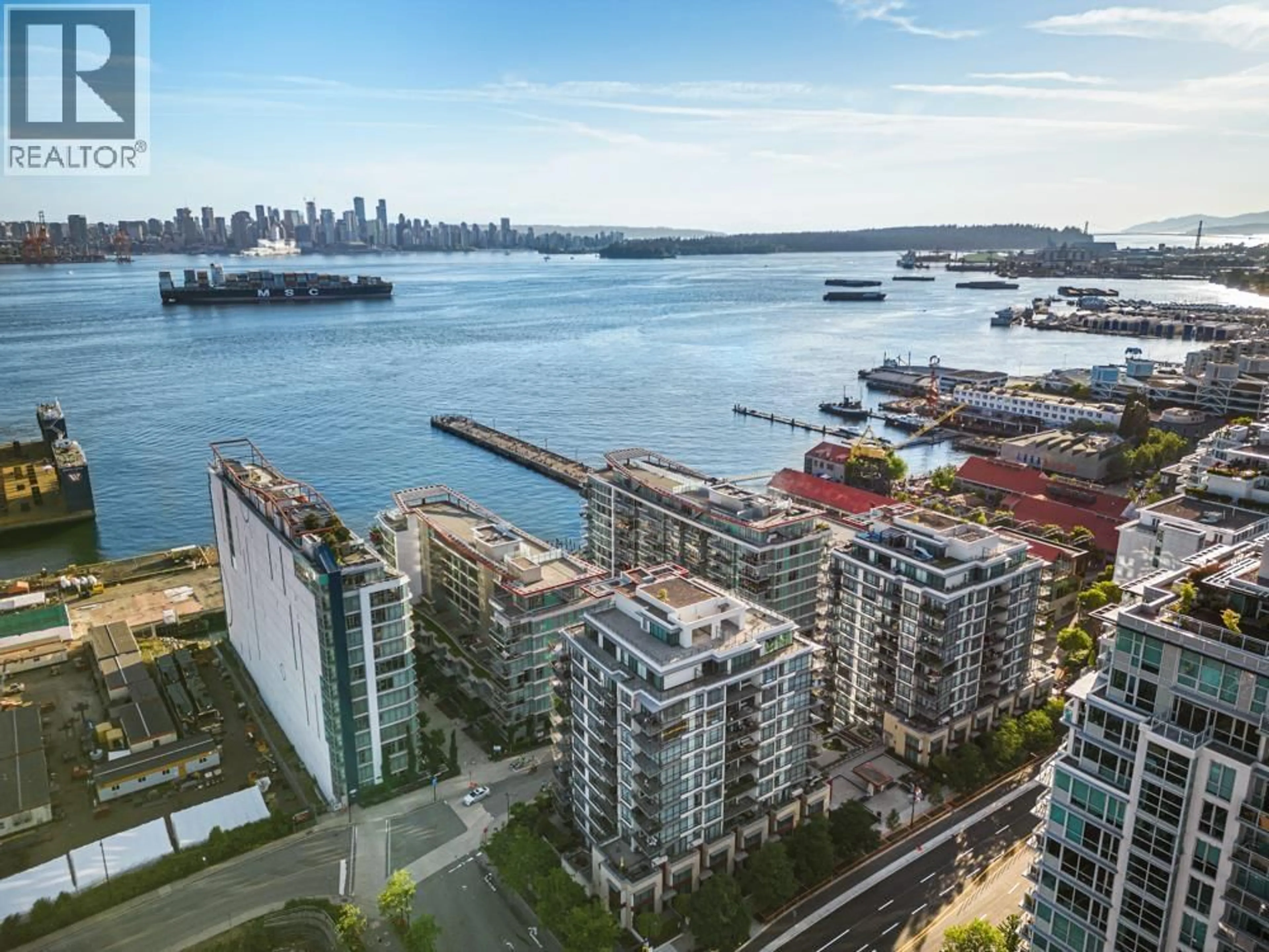 A pic from outside/outdoor area/front of a property/back of a property/a pic from drone, water/lake/river/ocean view for 305 - 185 VICTORY SHIP WAY, North Vancouver British Columbia V7L0G2