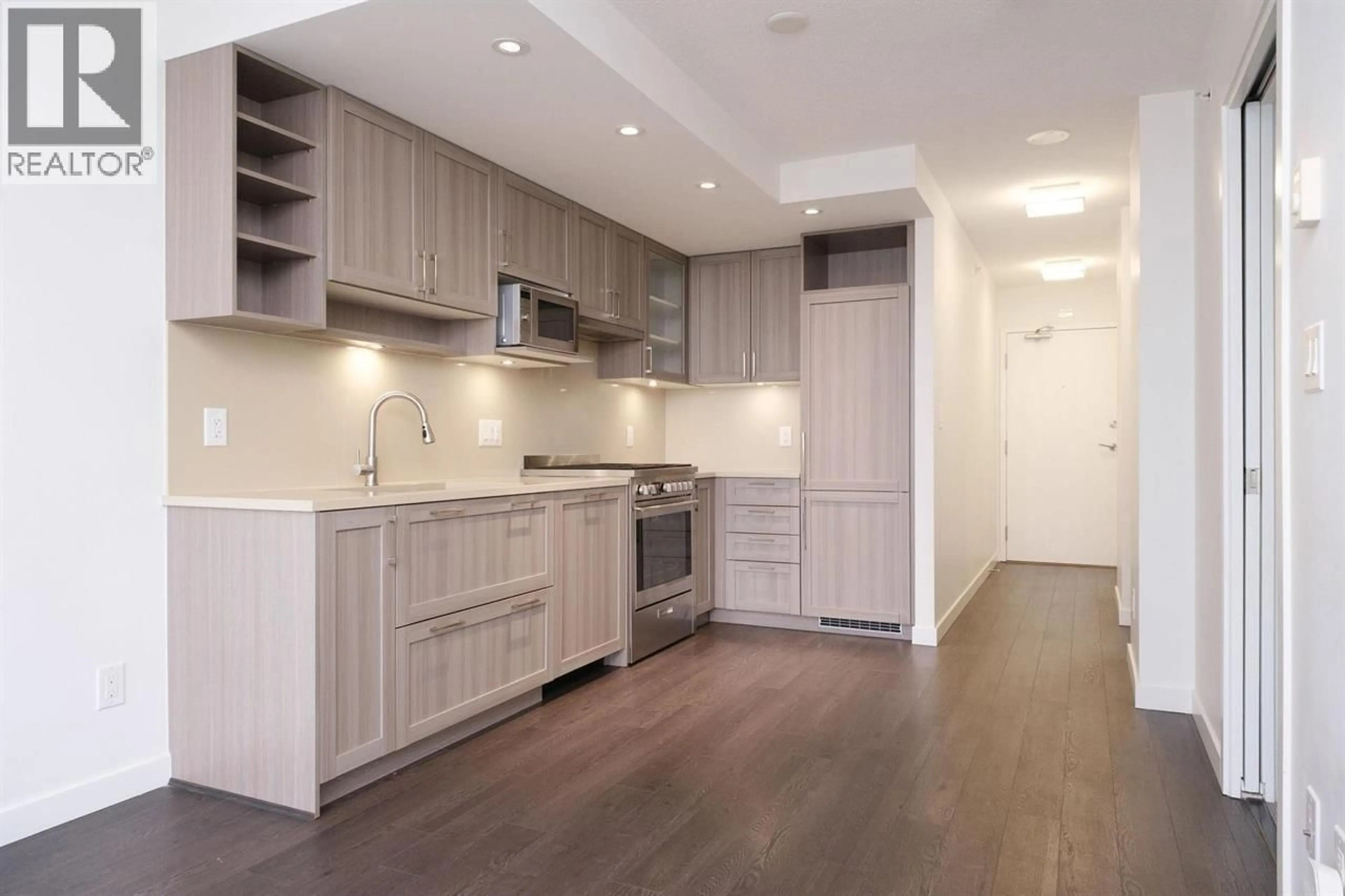 Open concept kitchen, wood/laminate floor for 2101 - 5470 ORMIDALE STREET, Vancouver British Columbia V5R0G6