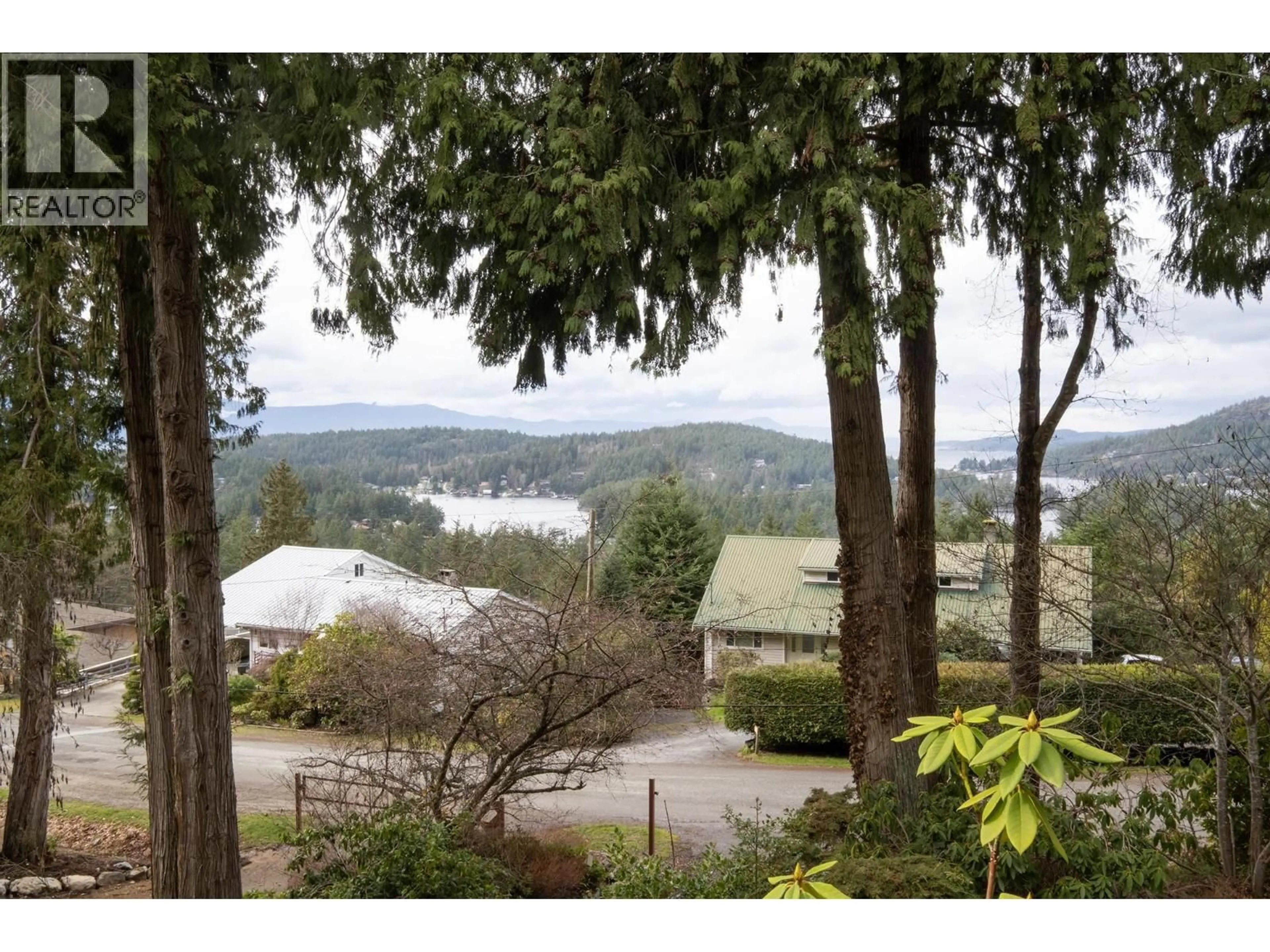 A pic from outside/outdoor area/front of a property/back of a property/a pic from drone, water/lake/river/ocean view for 12870 DOGWOOD DRIVE, Pender Harbour British Columbia V0N2H1