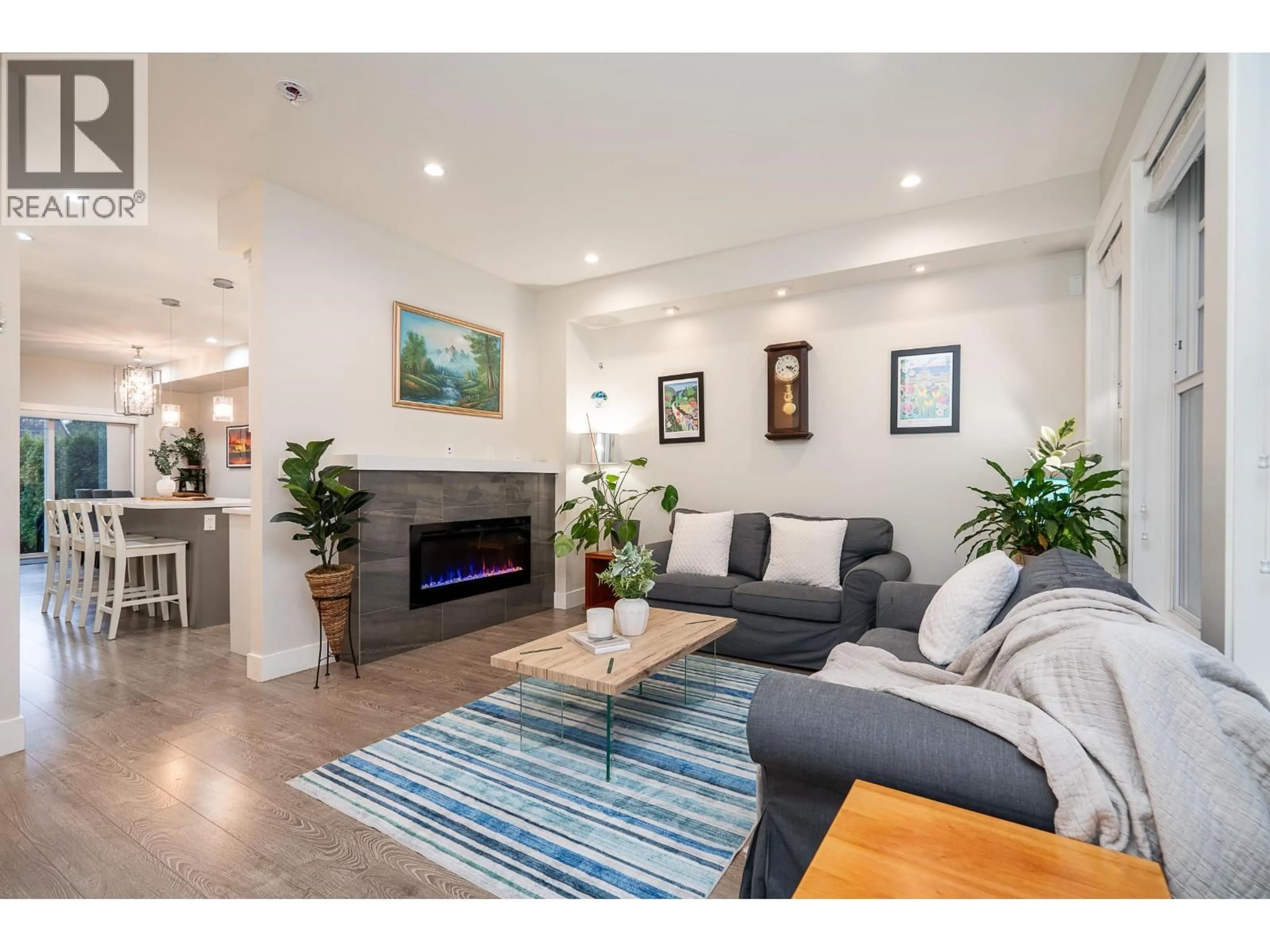 Living room with furniture, unknown for 103 - 3410 QUEENSTON AVENUE, Coquitlam British Columbia V3E3H1