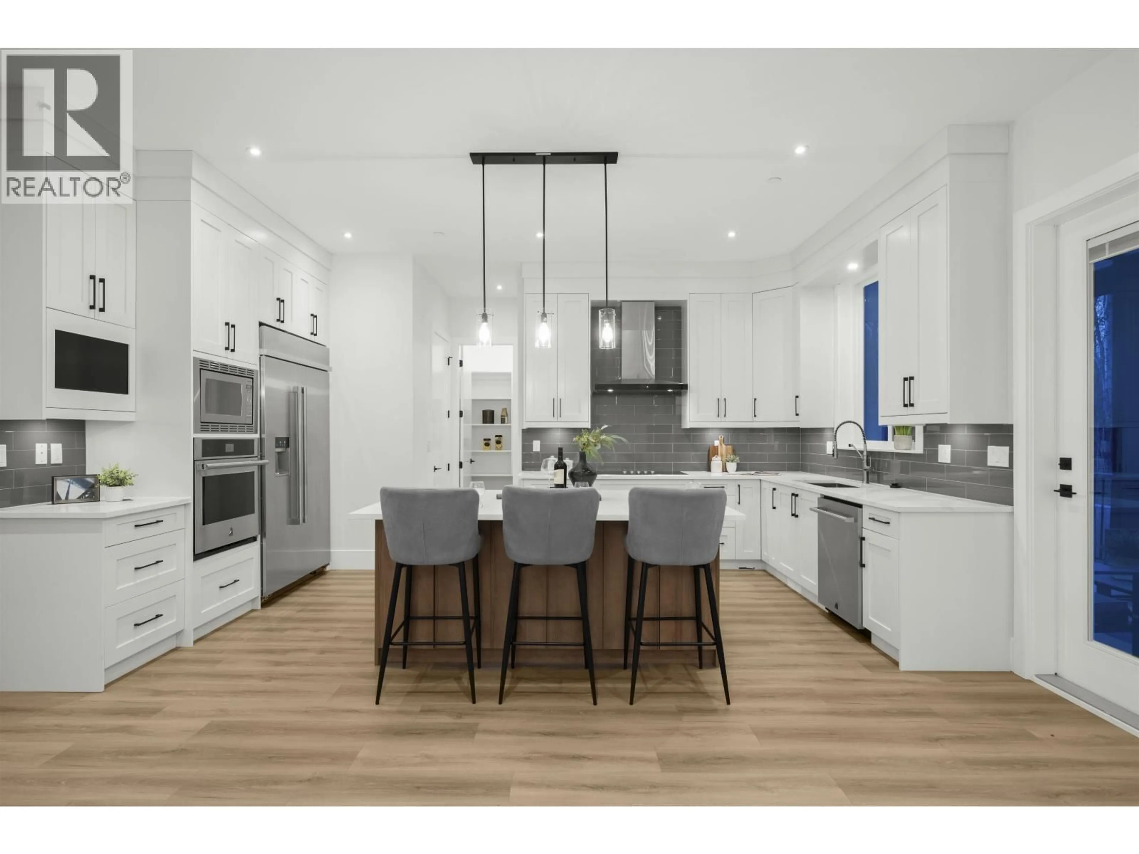 Open concept kitchen, wood/laminate floor for 11018 243B STREET, Maple Ridge British Columbia V2W1H5