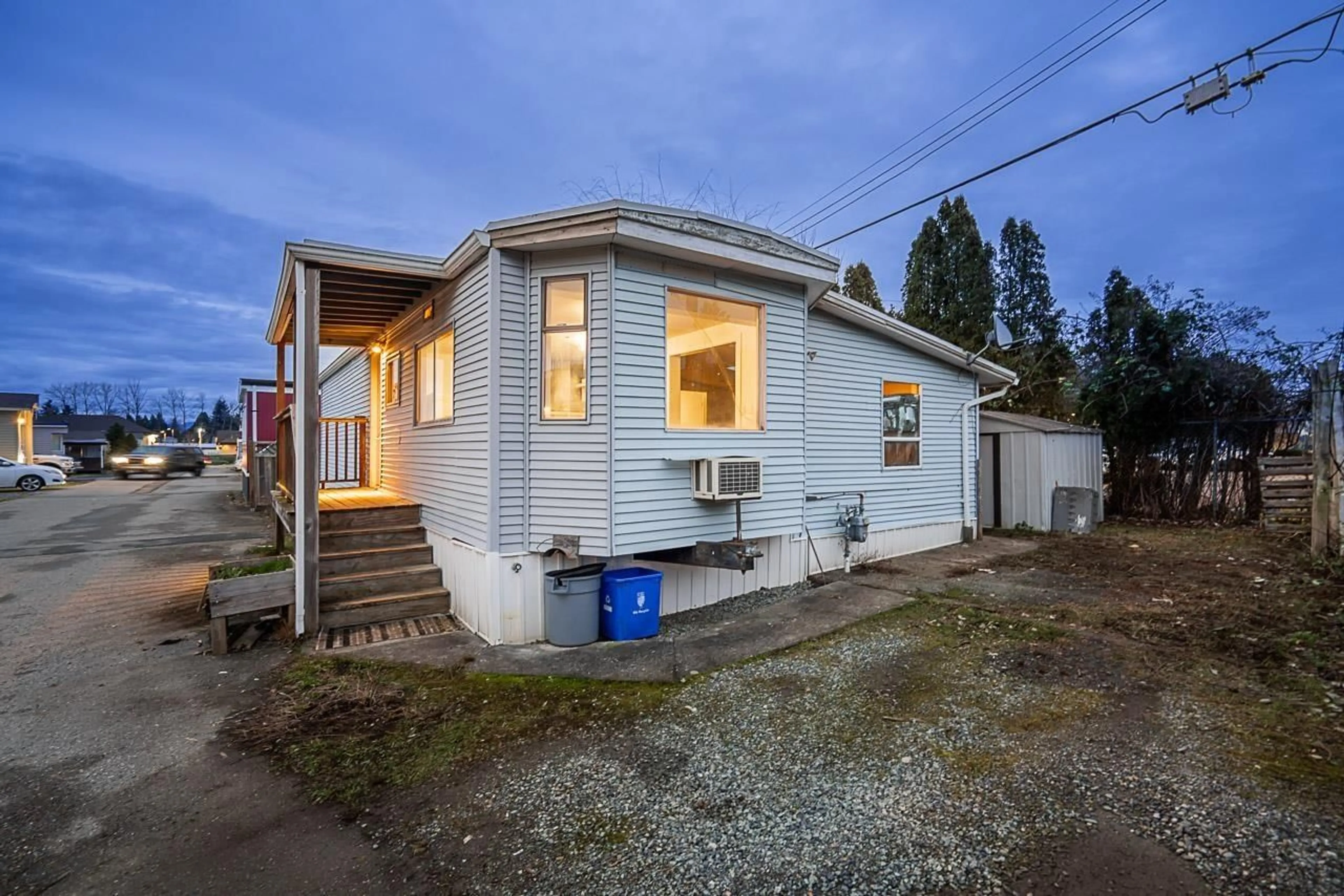 Home with vinyl exterior material, street for 54 - 26892 FRASER HIGHWAY, Langley British Columbia V4W3T6