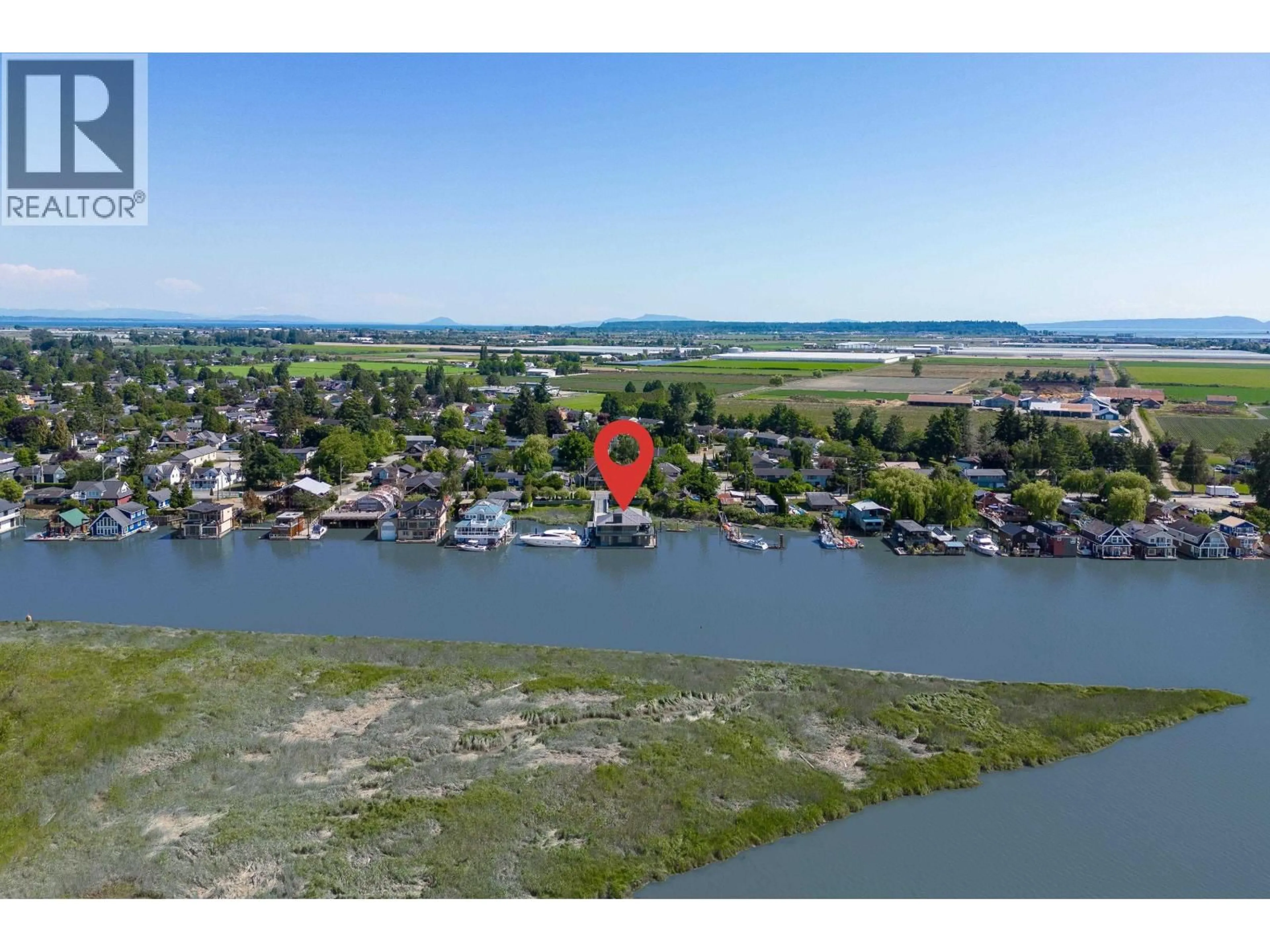 A pic from outside/outdoor area/front of a property/back of a property/a pic from drone, water/lake/river/ocean view for 4379 RIVER ROAD, Delta British Columbia V4K1R9