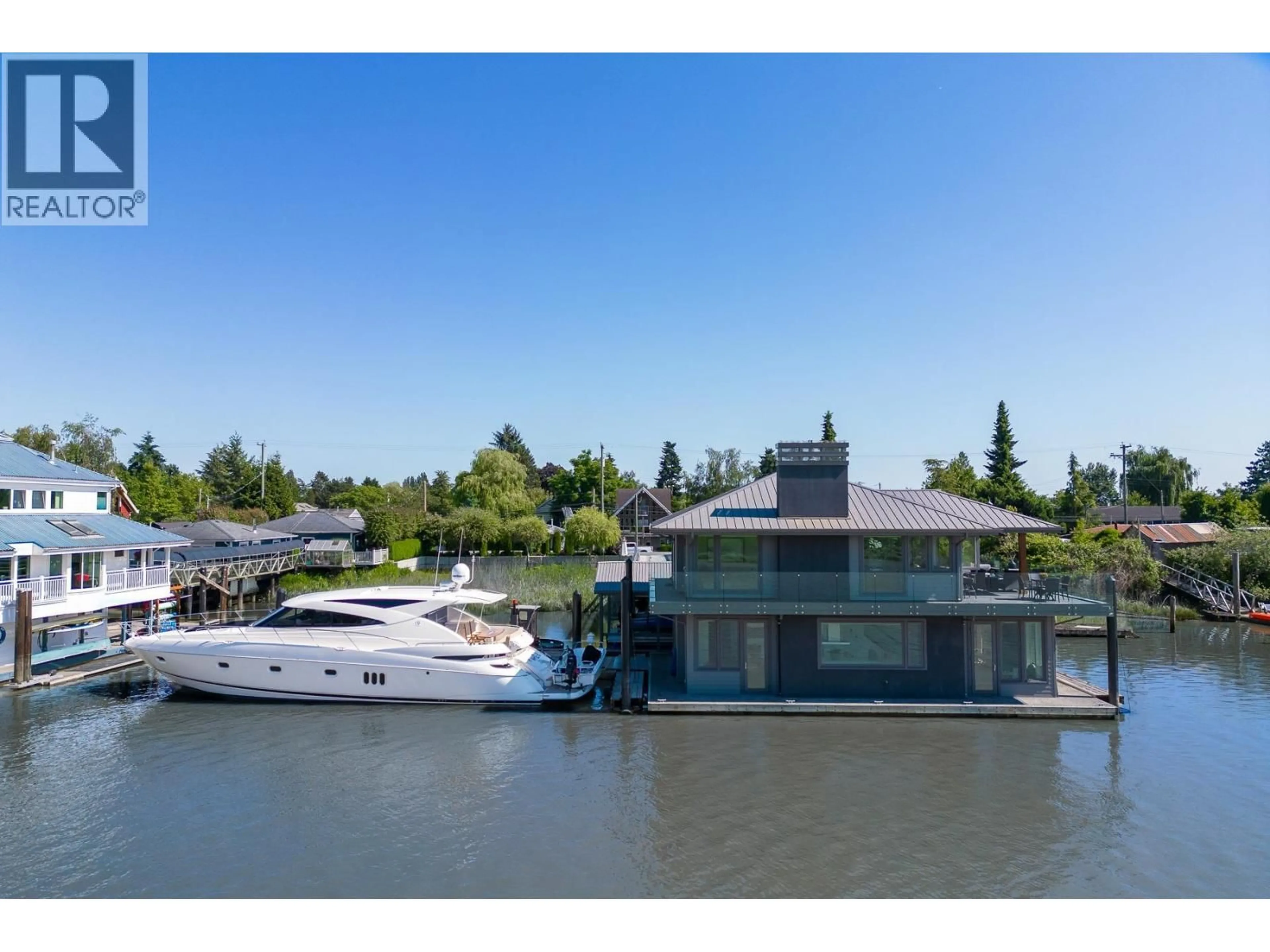 A pic from outside/outdoor area/front of a property/back of a property/a pic from drone, water/lake/river/ocean view for 4379 RIVER ROAD, Delta British Columbia V4K1R9