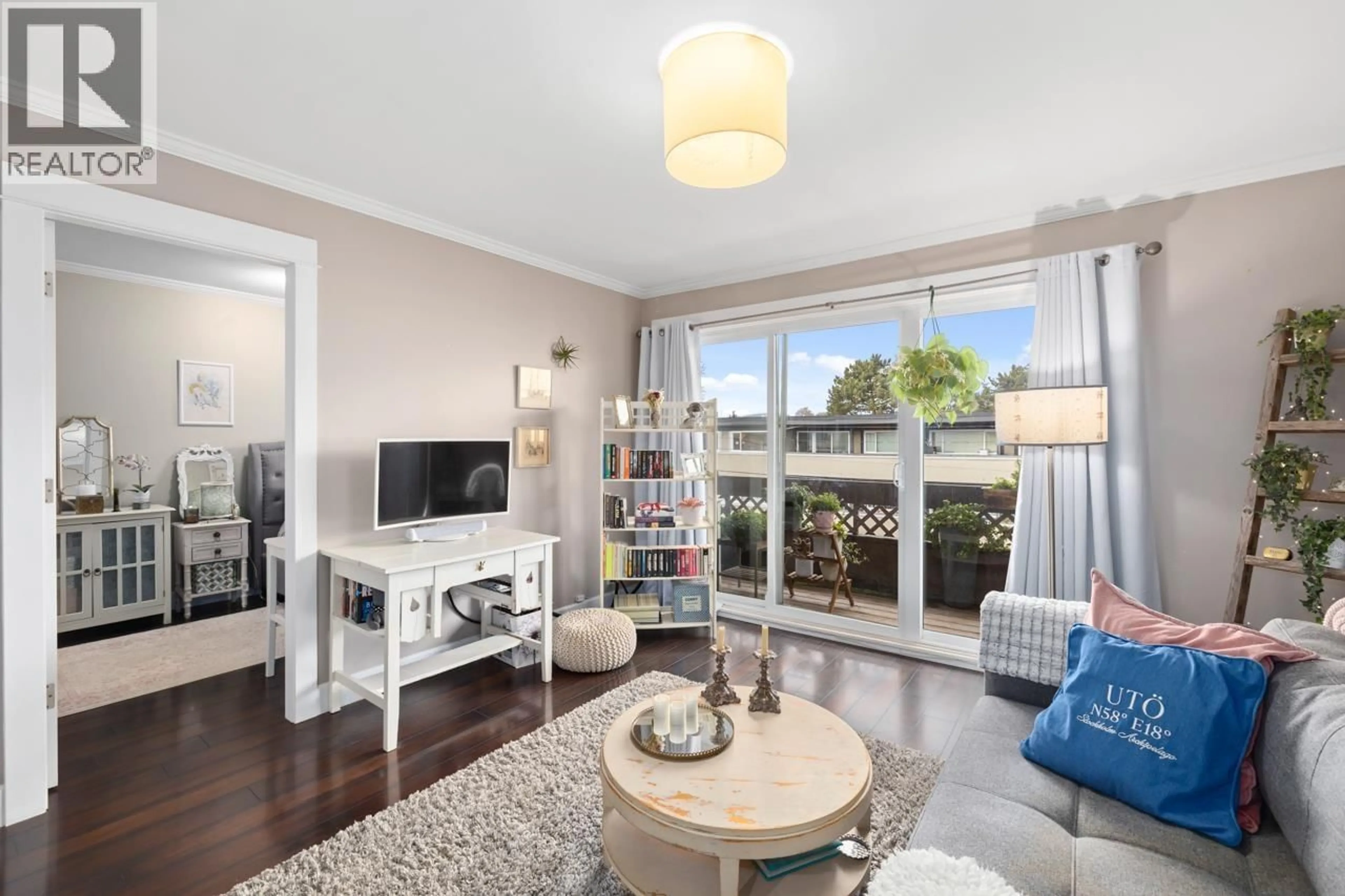 Living room with furniture, wood/laminate floor for 308 - 2025 2ND AVENUE, Vancouver British Columbia V6J1J6