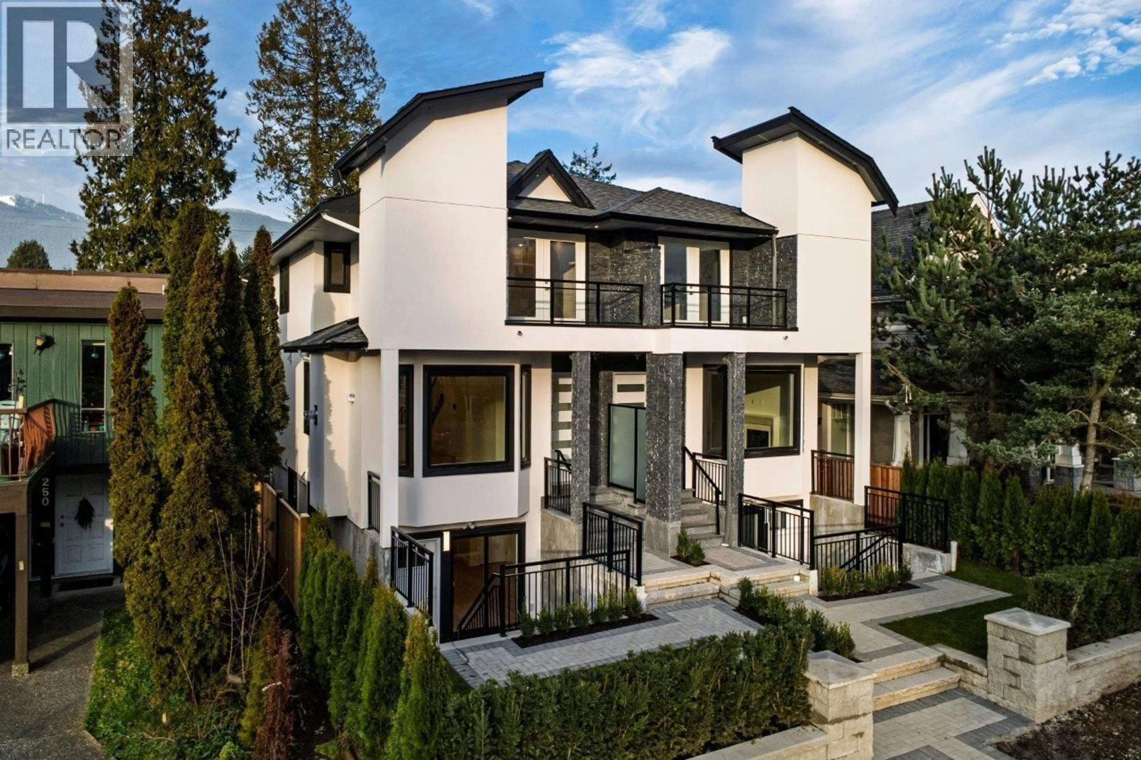 Home with brick exterior material, street for 254 18TH STREET, North Vancouver British Columbia V7L2X6