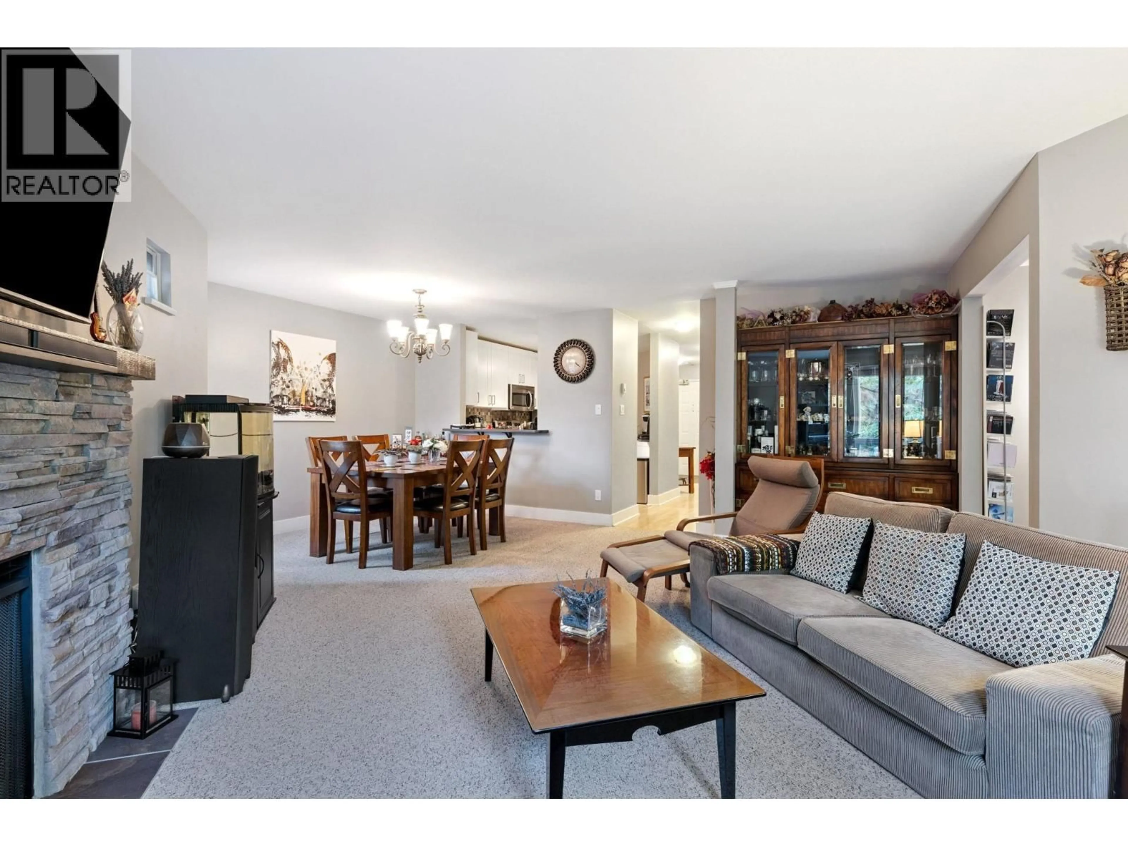 Living room with furniture, unknown for 206 - 7459 MOFFATT ROAD, Richmond British Columbia V6Y1X9